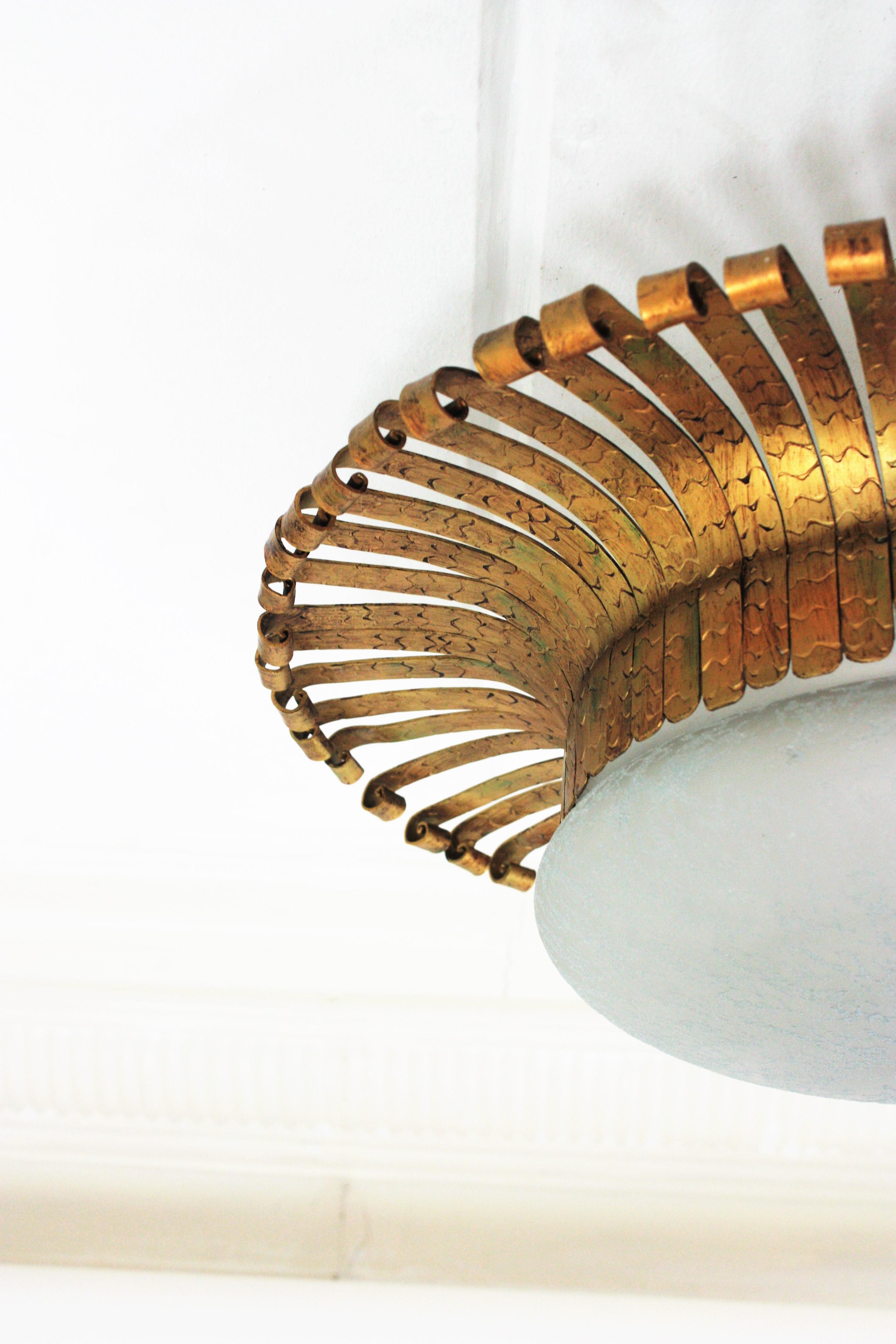 Spanish Sunburst Light Fixture in Wrought Gilt Iron with Frosted Glass Shade For Sale 11