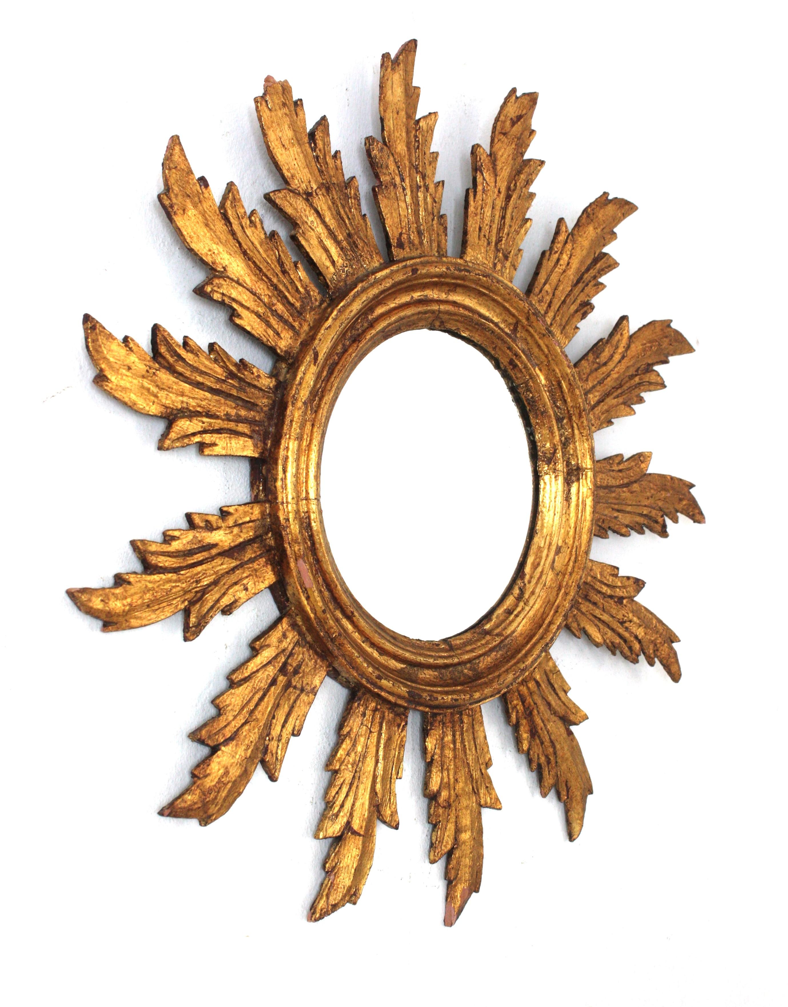 Baroque Spanish Sunburst Mirror in Carved Giltwood, 1950s For Sale