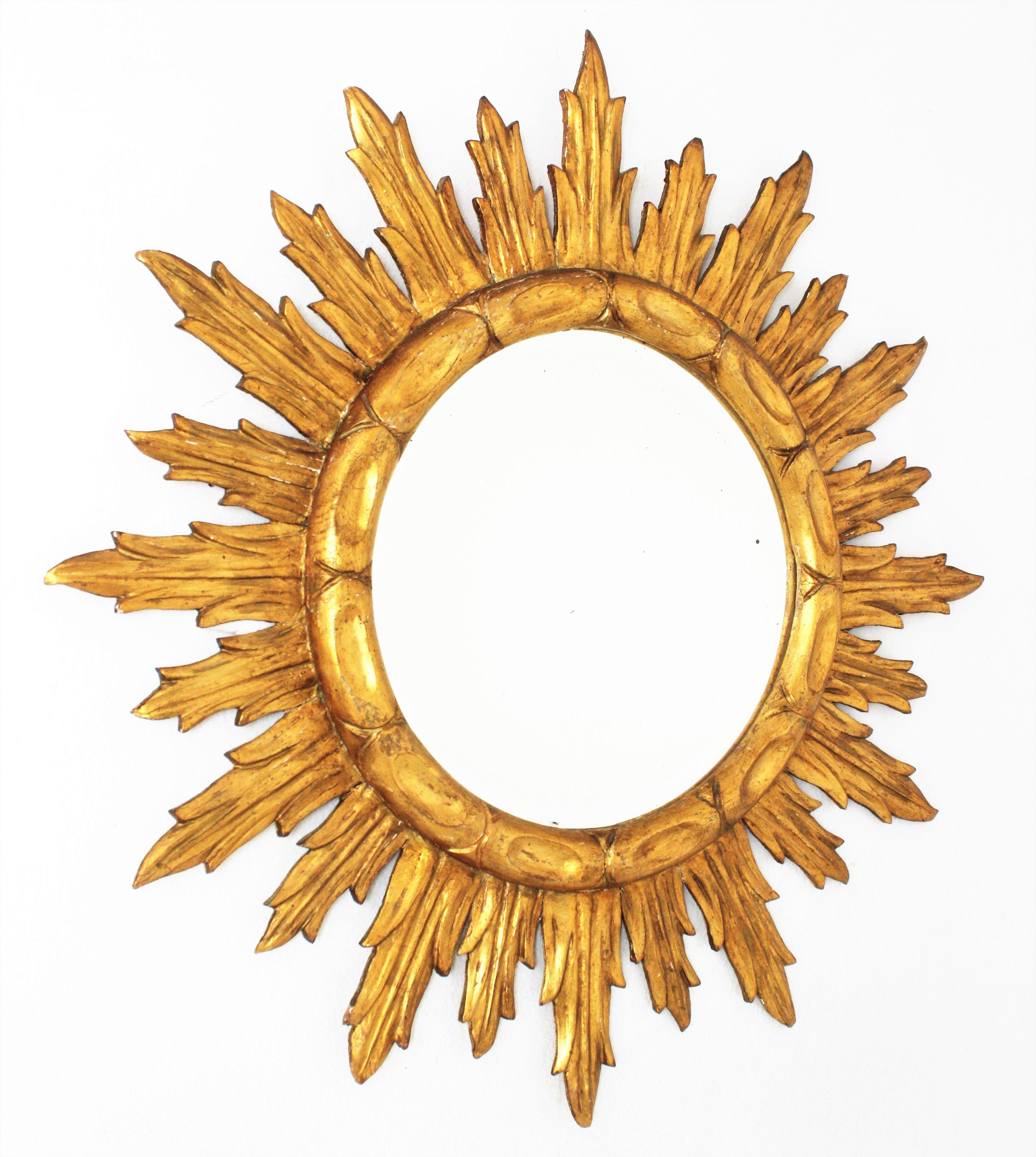 Mid-Century Modern Spanish Sunburst Mirror in Carved Giltwood, 1950s For Sale