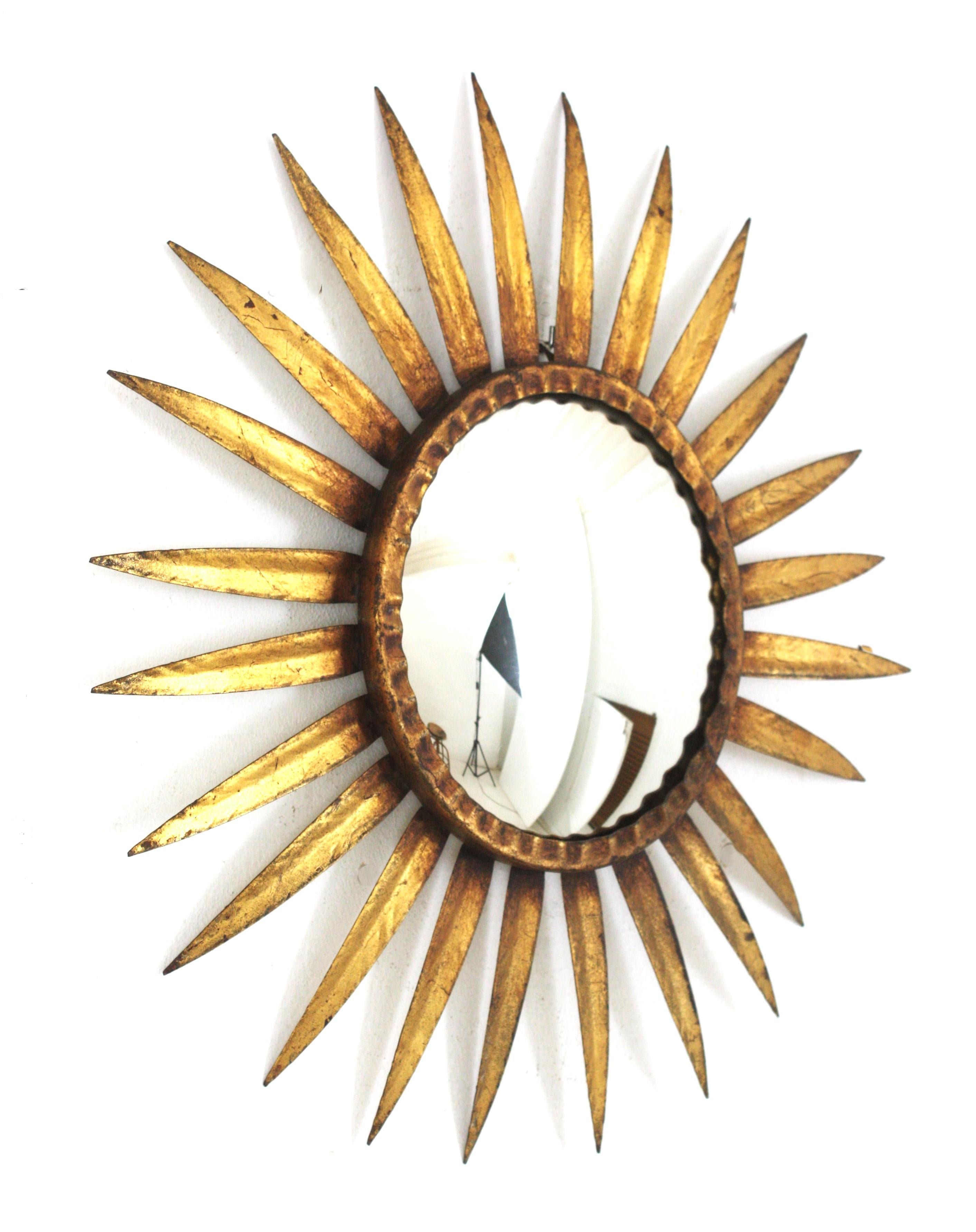 Mid-Century Modern Spanish Sunburst Mirror in Gilt Metal, Convex Glass For Sale