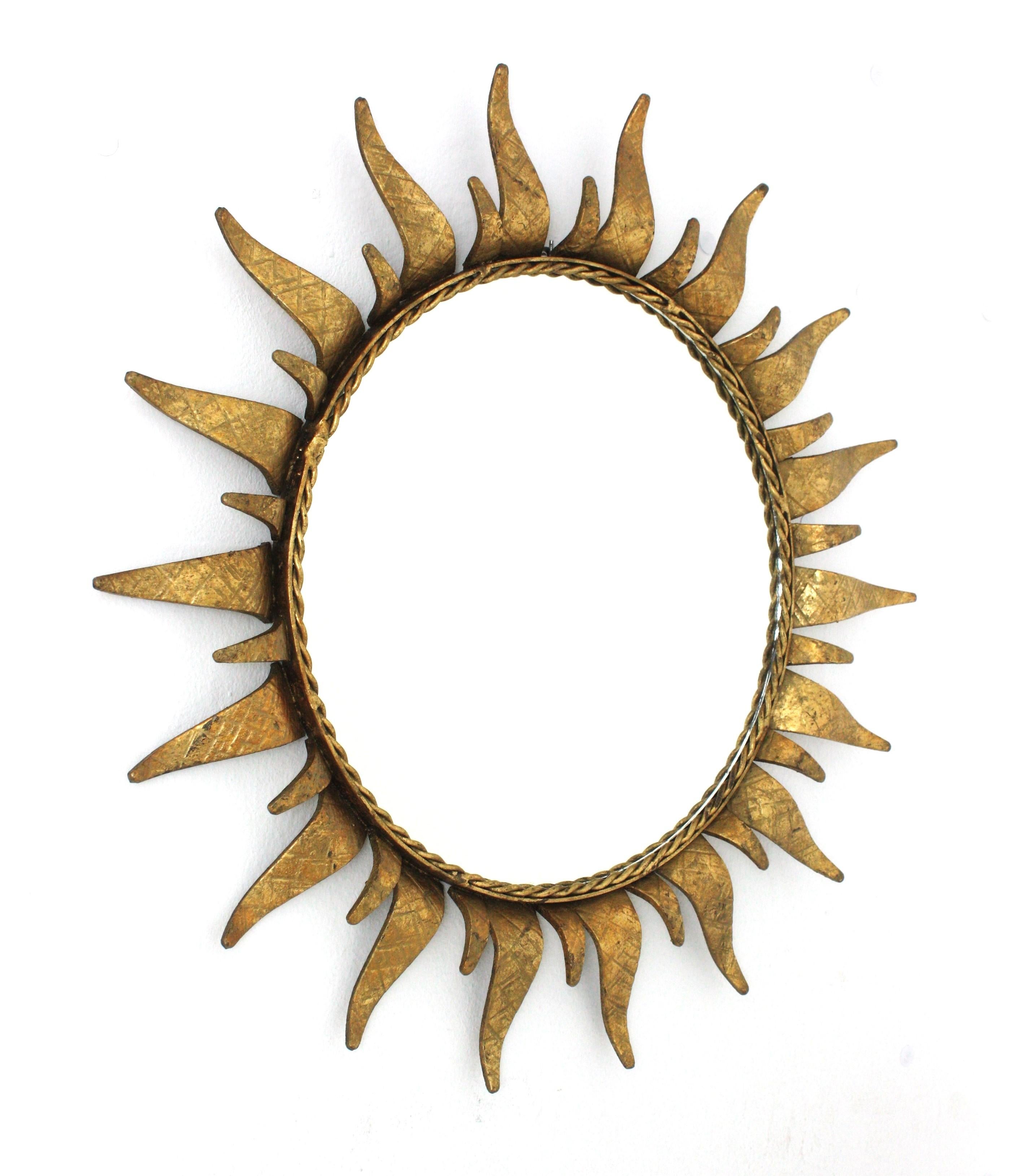 Mid-Century Modern Spanish Sunburst Mirror in Gilt Wrought Iron, 1950s For Sale