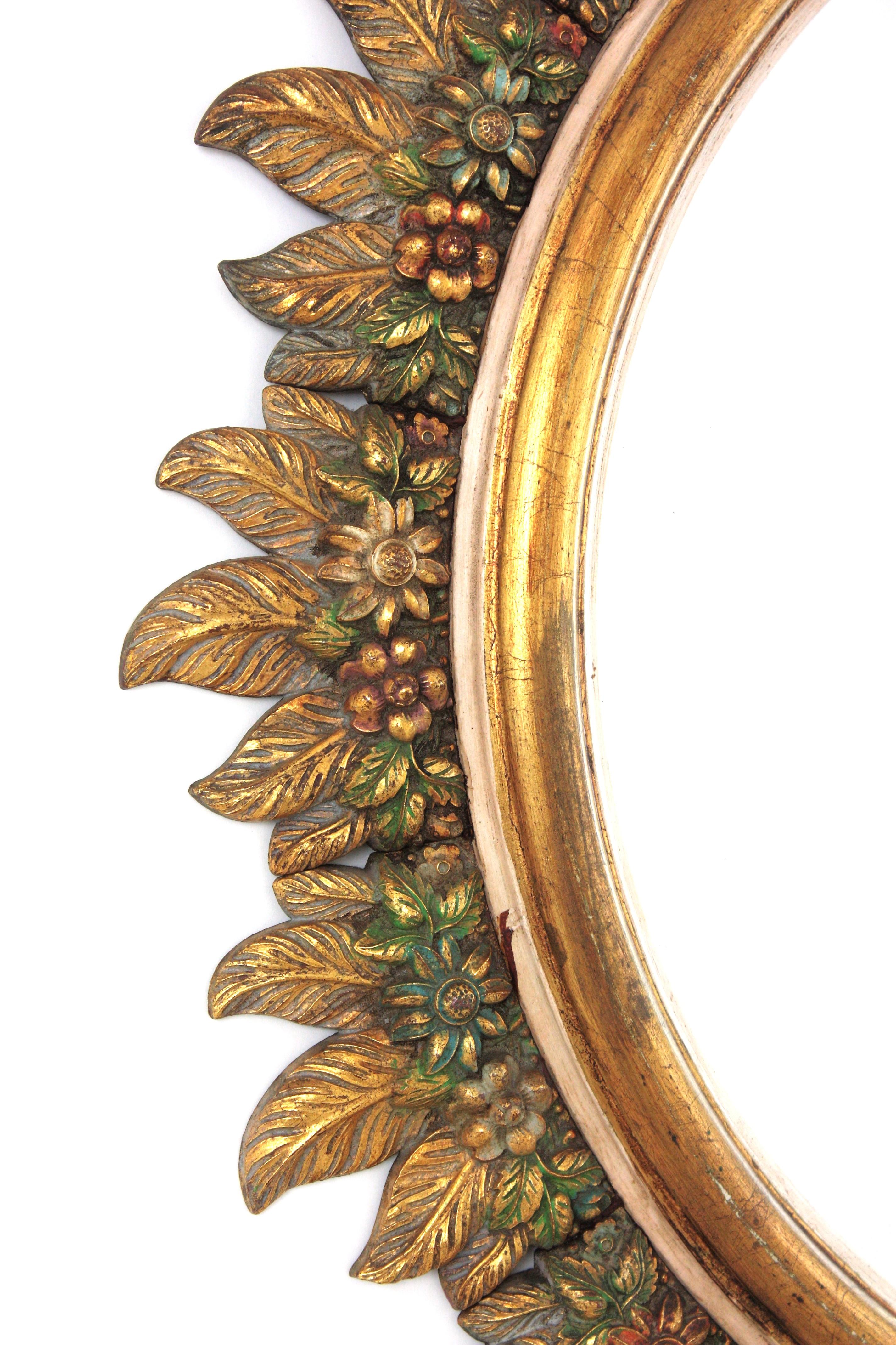 Spagnolo Spanish Sunburst Mirror in Giltwood with Flowers Carved Frame, 1950s in vendita