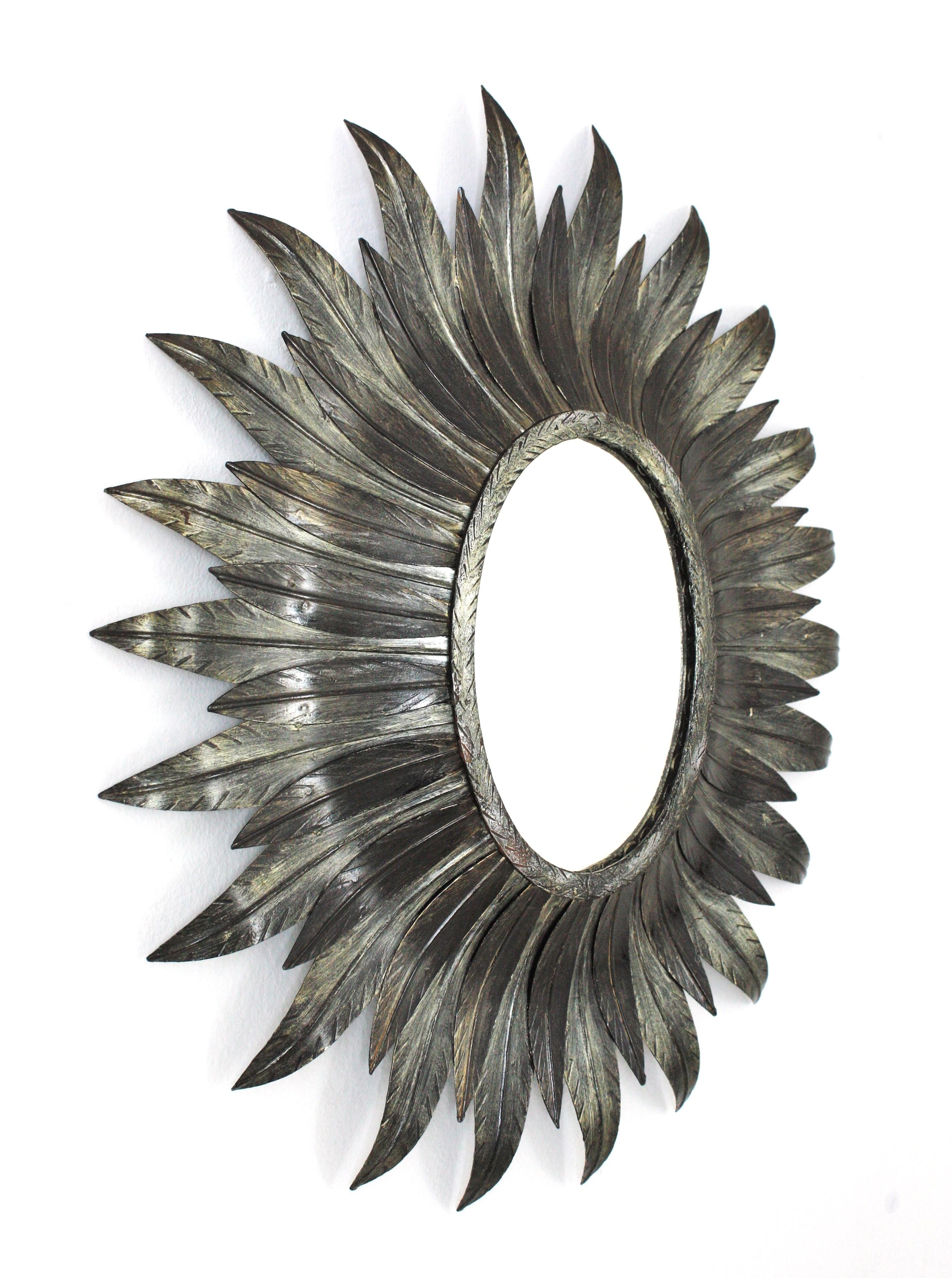 Mid-Century Modern Spanish Sunburst Oval Leafed Mirror in Silvered Metal For Sale