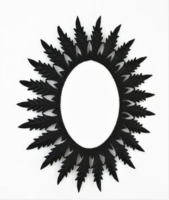 Spanish Sunburst Oval Mirror in Black Painted Iron, 1960s