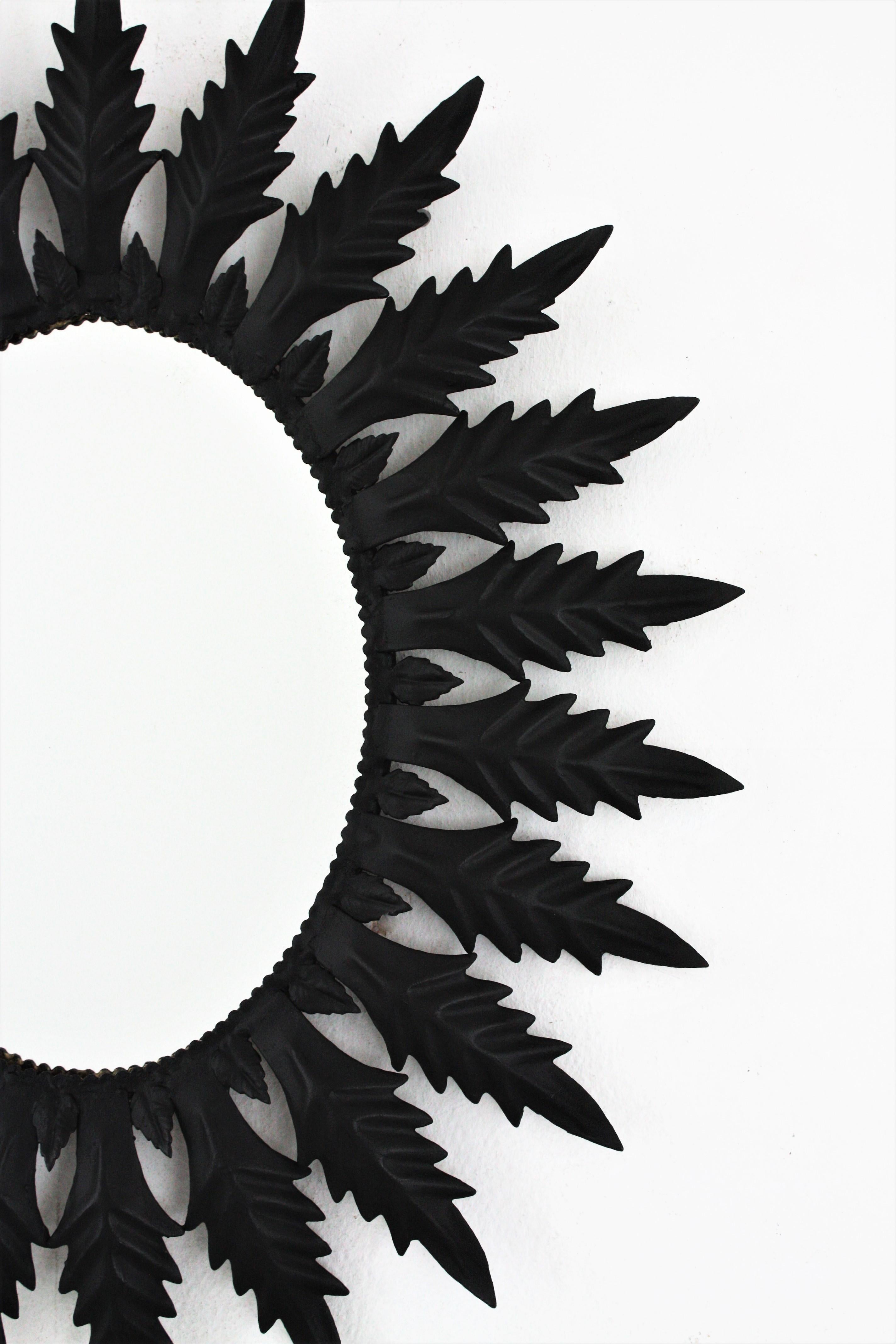 20th Century Spanish Sunburst Oval Mirror in Black Painted Iron, 1960s For Sale