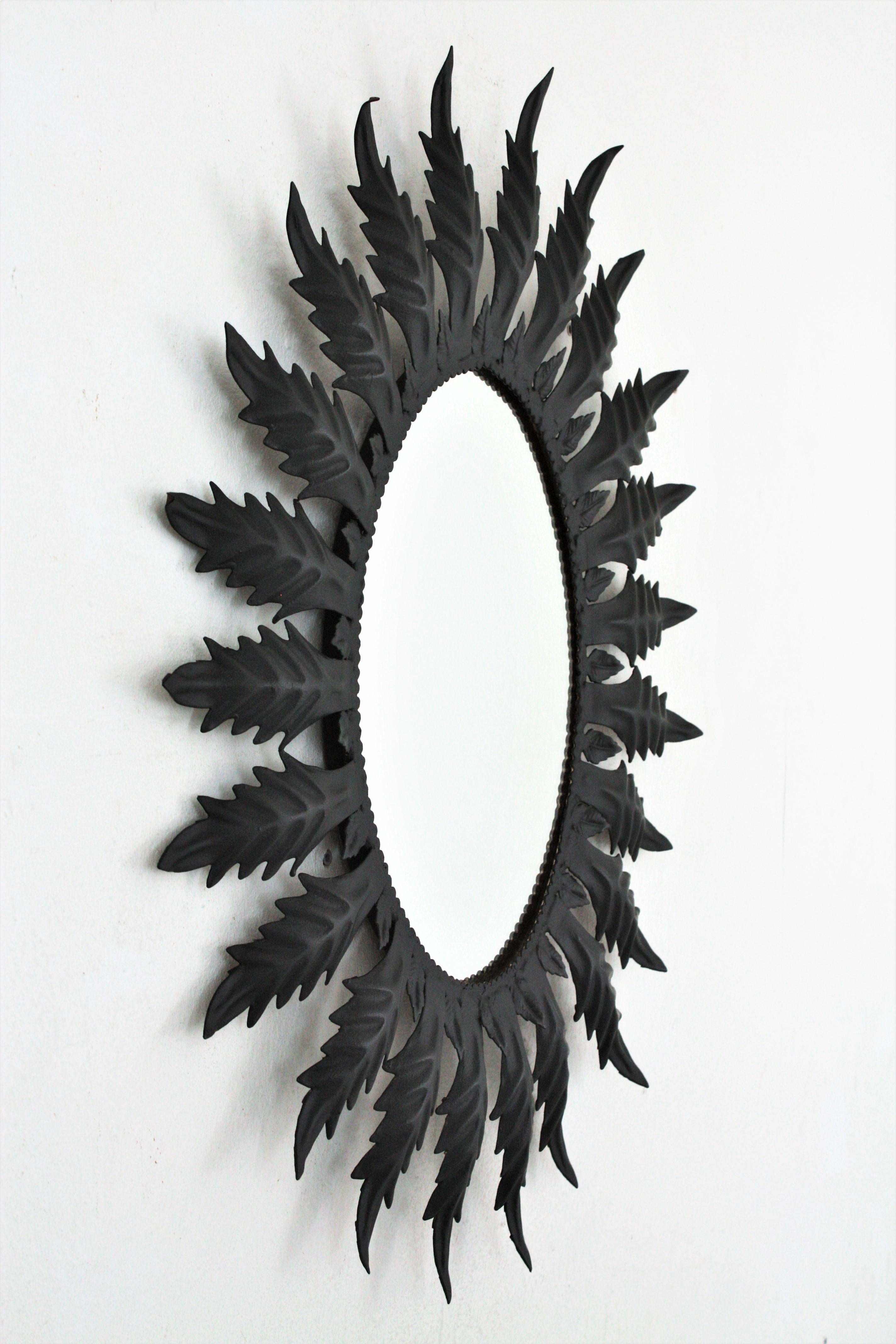 Spanish Sunburst Oval Mirror in Black Painted Iron, 1960s For Sale 2