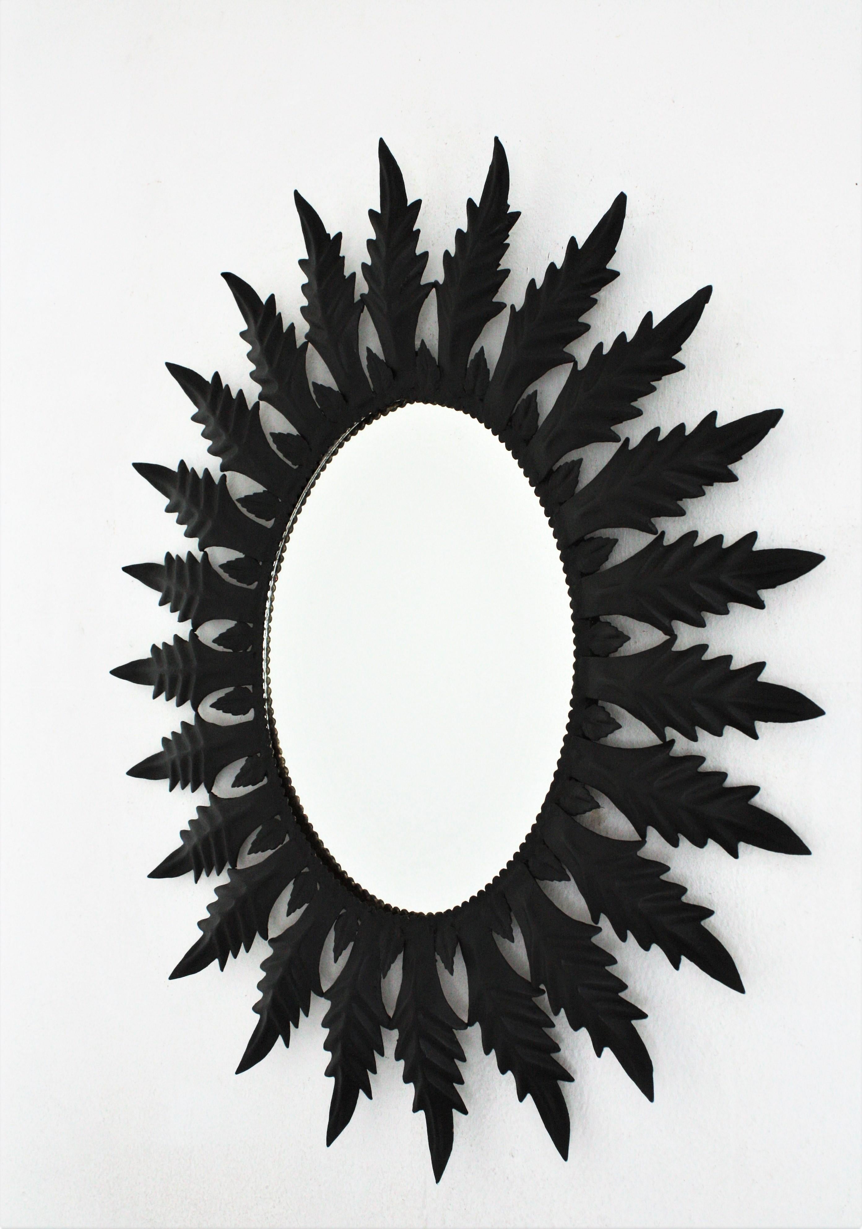 Spanish Sunburst Oval Mirror in Black Painted Iron, 1960s For Sale 3