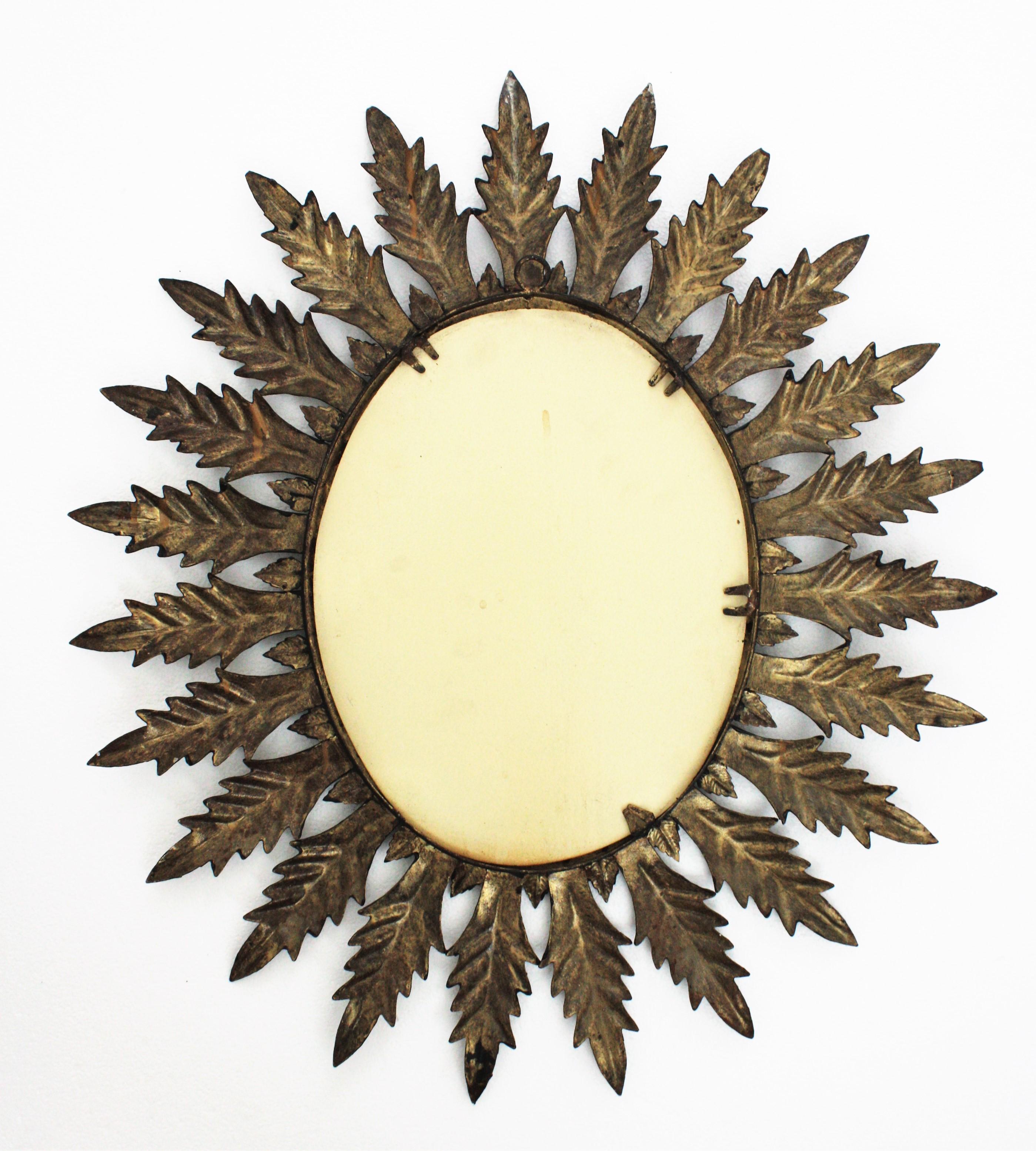 Spanish Sunburst Oval Mirror in Black Painted Iron, 1960s For Sale 4