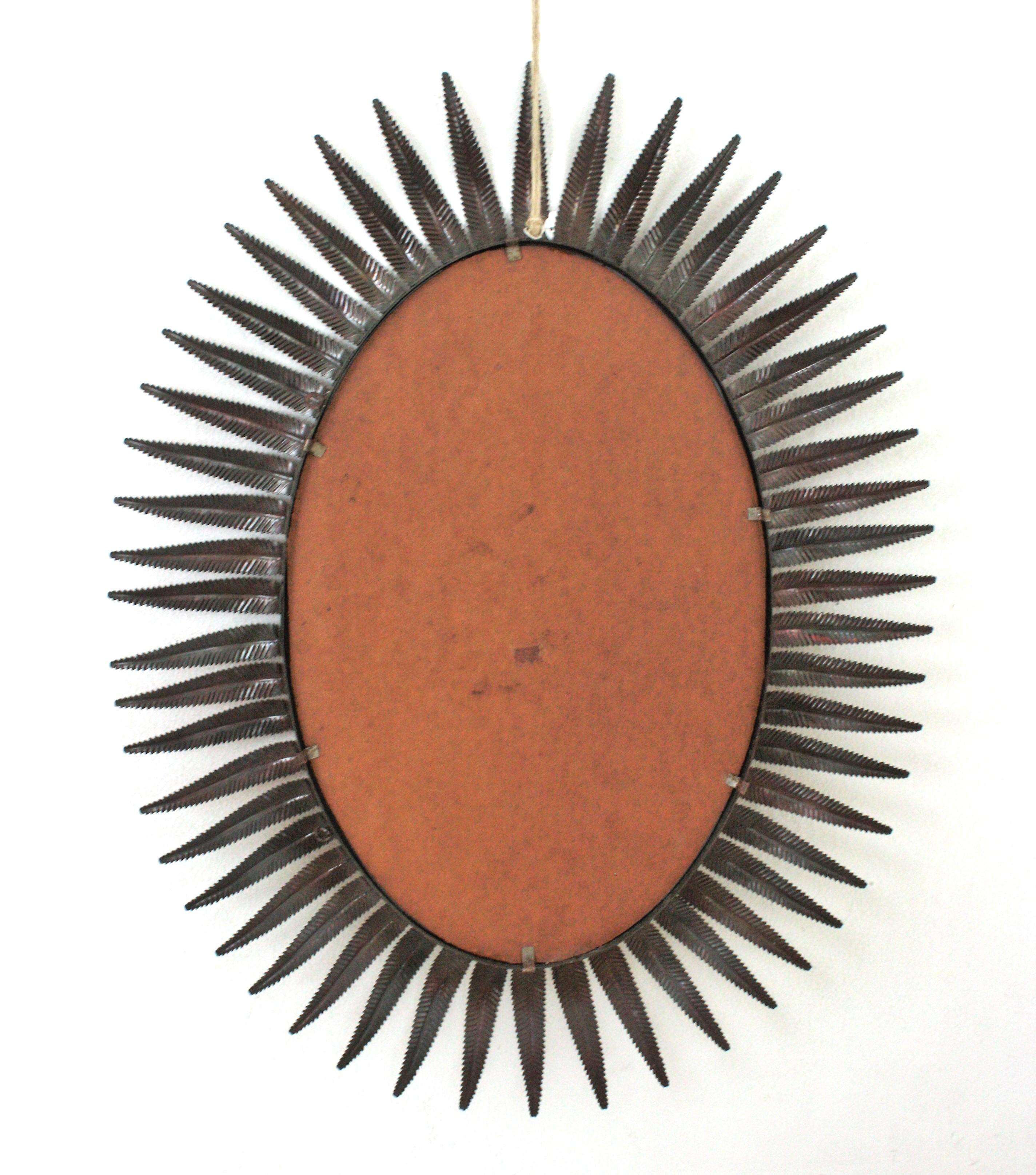 Spanish Sunburst Oval Mirror in Copper Metal, 1950s For Sale 6