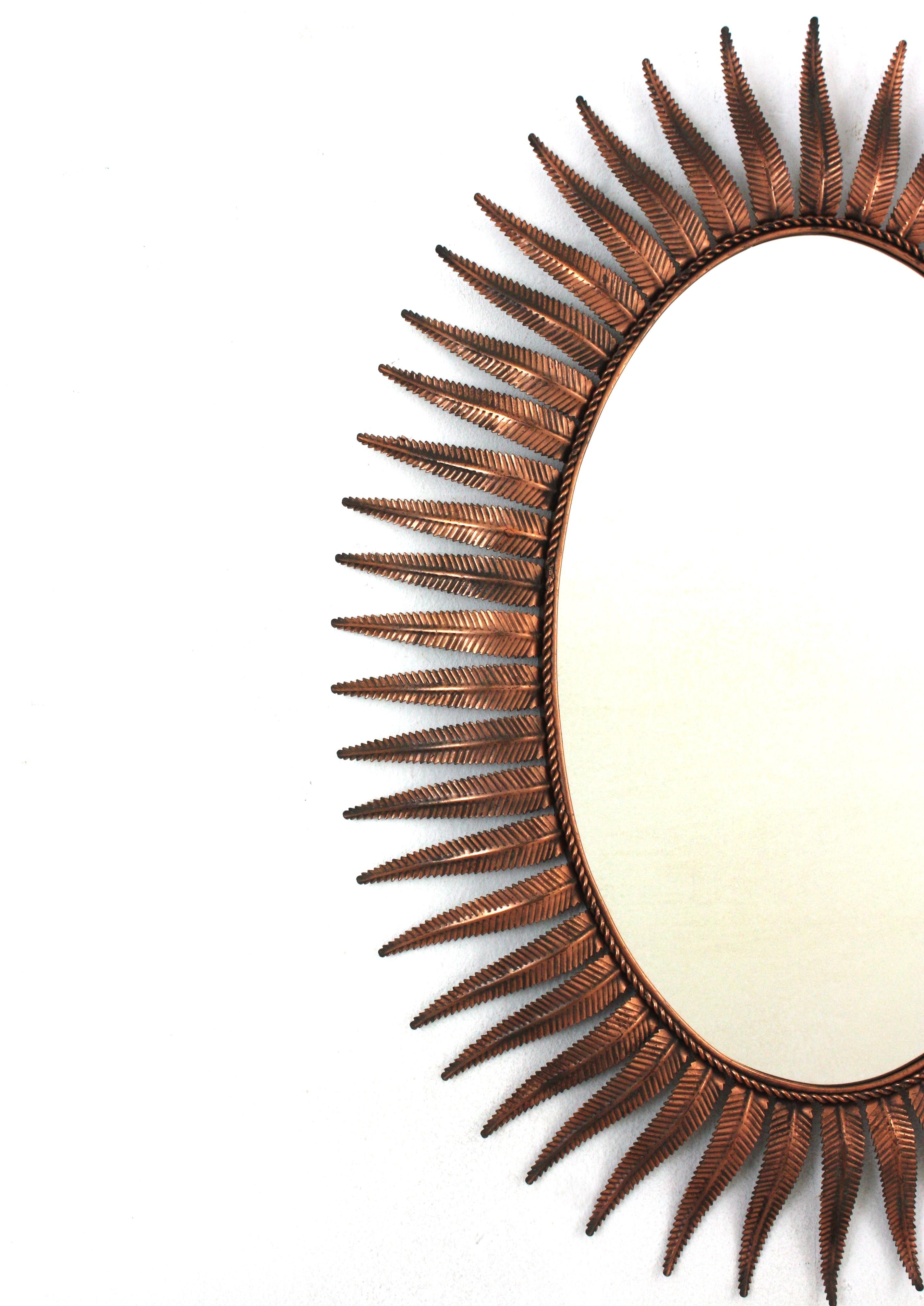 Spanish Sunburst Oval Mirror in Copper Metal, 1950s In Good Condition For Sale In Barcelona, ES