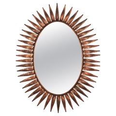Espejo oval español Sunburst en metal cobrizo, años 50