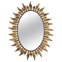 Spanish Sunburst Oval Mirror in Gilt Metal with Leafed Frame