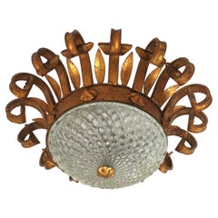 Spanish Sunburst Scrollwork Light Fixture in Gilt Wrought Iron and Glass, 1940s