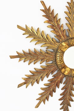 Starburst Sunburst Mirror in Giltwood with Foliage Carvings, 1940s