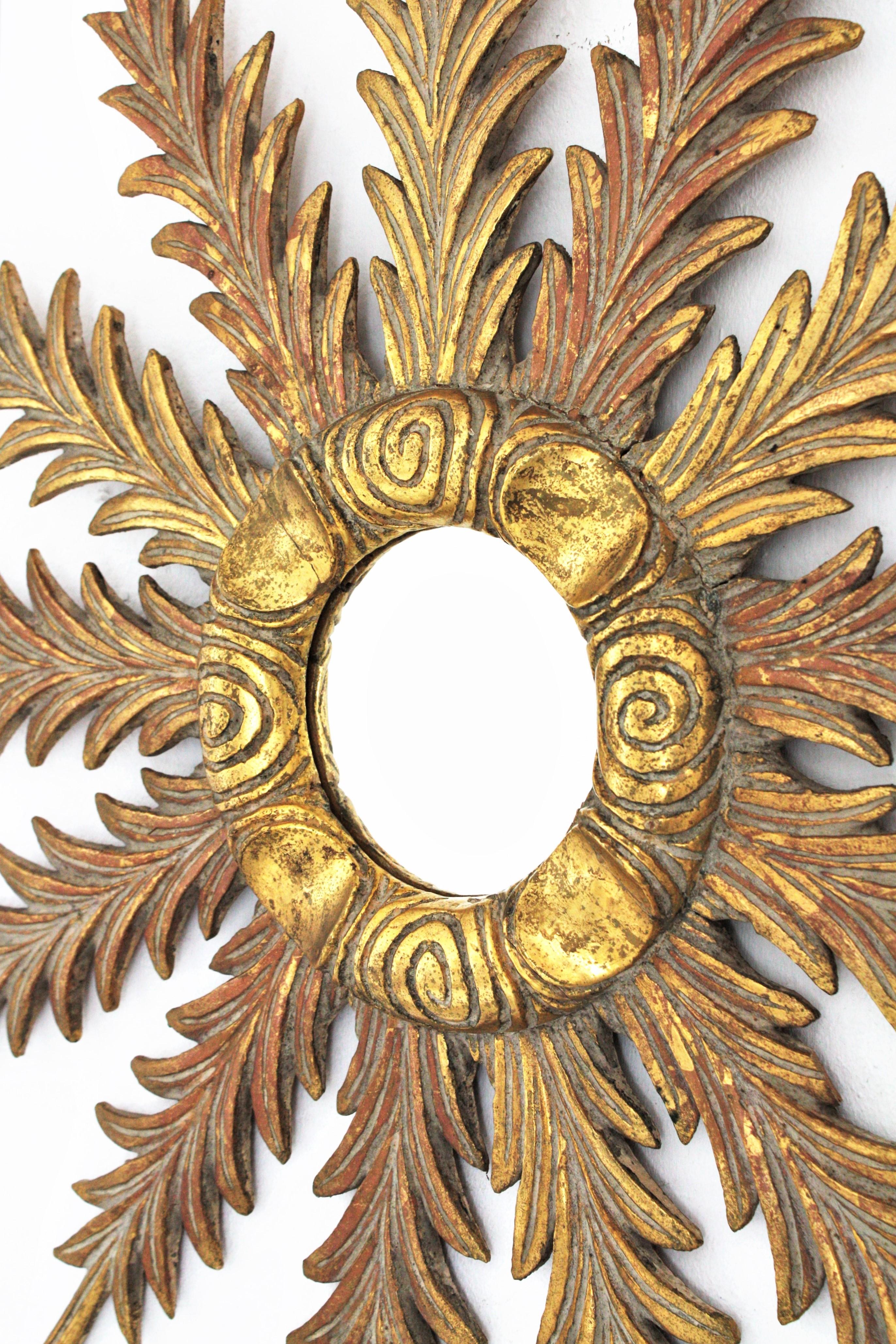 Carved Sunburst Starburst Giltwood Mirror with Foliage Carvings, 1940s For Sale