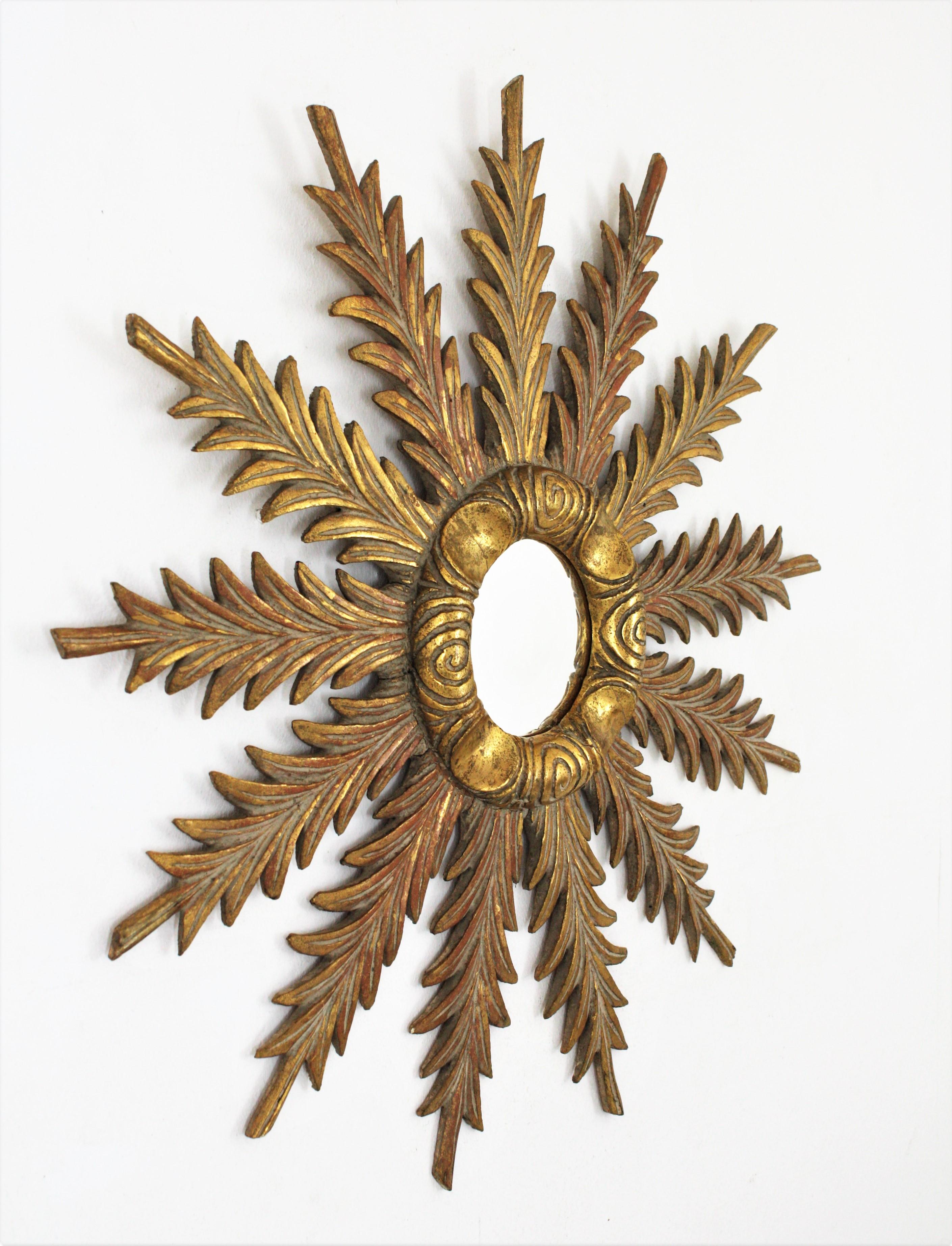 20th Century Sunburst Starburst Giltwood Mirror with Foliage Carvings, 1940s For Sale