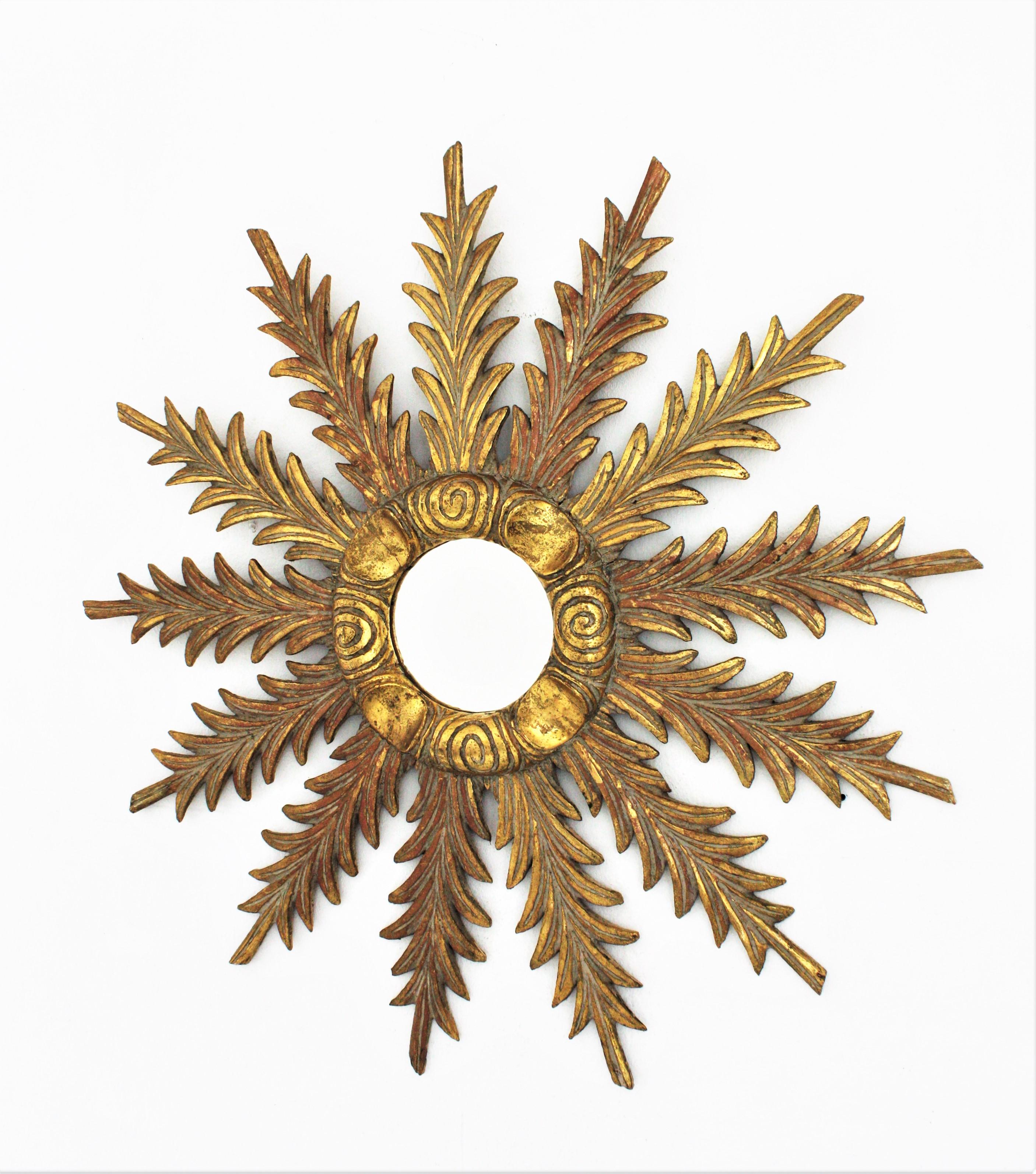 Sunburst Starburst Giltwood Mirror with Foliage Carvings, 1940s For Sale 1