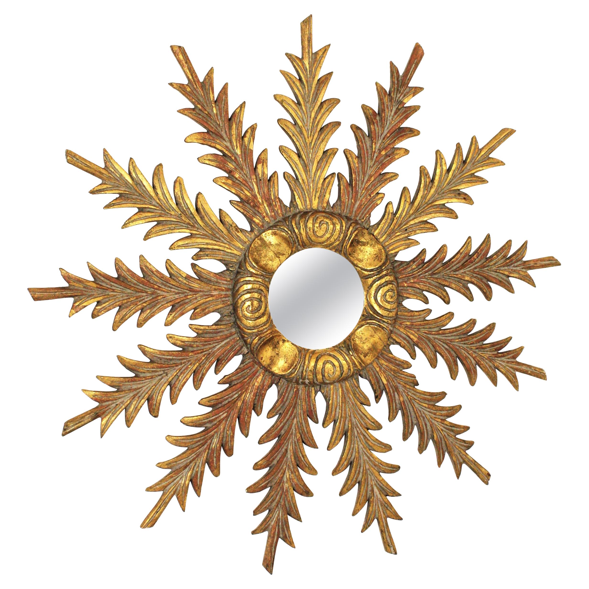 Starburst Sunburst Mirror in Giltwood with Foliage Carvings, 1940s