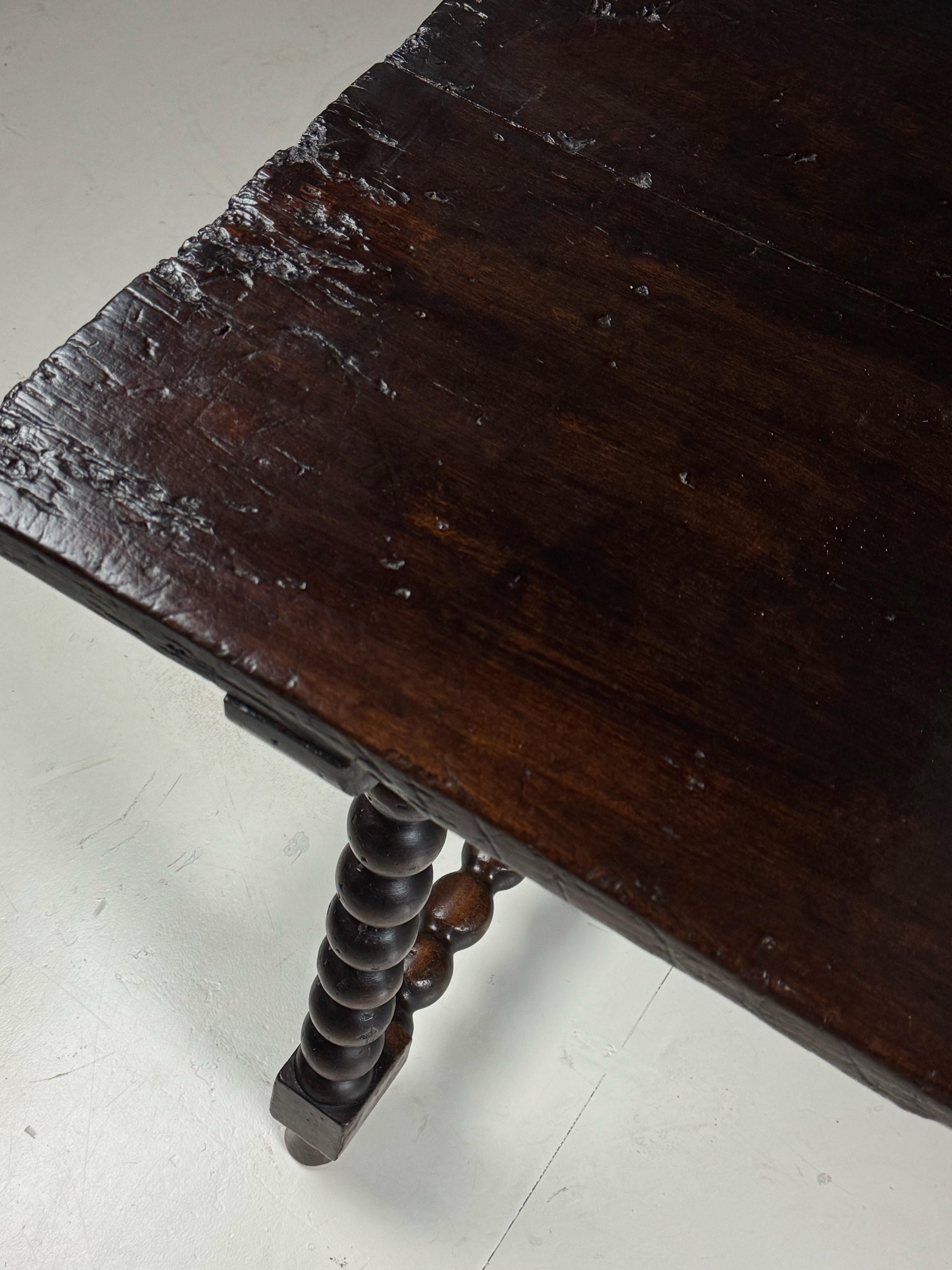Spanish Table, 18th century

Originally from Spain. Dating from the 18th century. Made of walnut.

With bobbin motif in base. Restorations carried out in various places.

Can be used as a dining table / work table / desk / side table.

Sturdy and