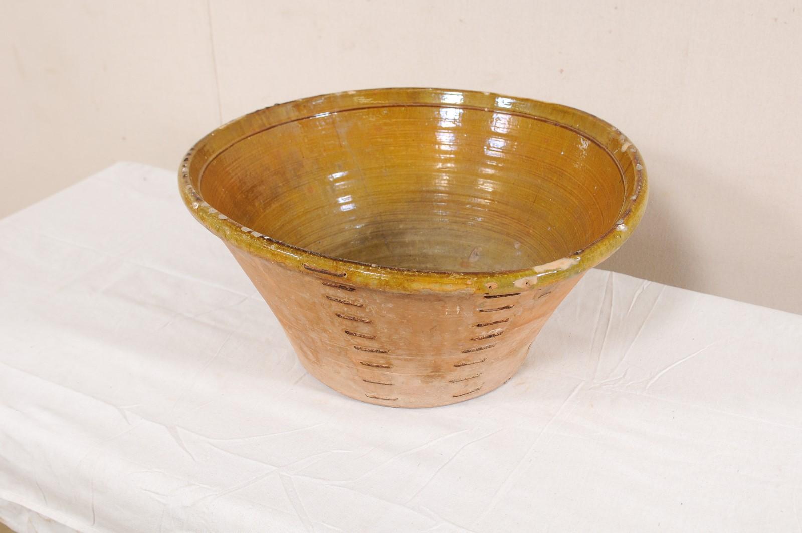 Spanish Terracotta Bowl w/ Muted Yellow & Pale Green Inner Glaze and Old Mending In Good Condition In Atlanta, GA
