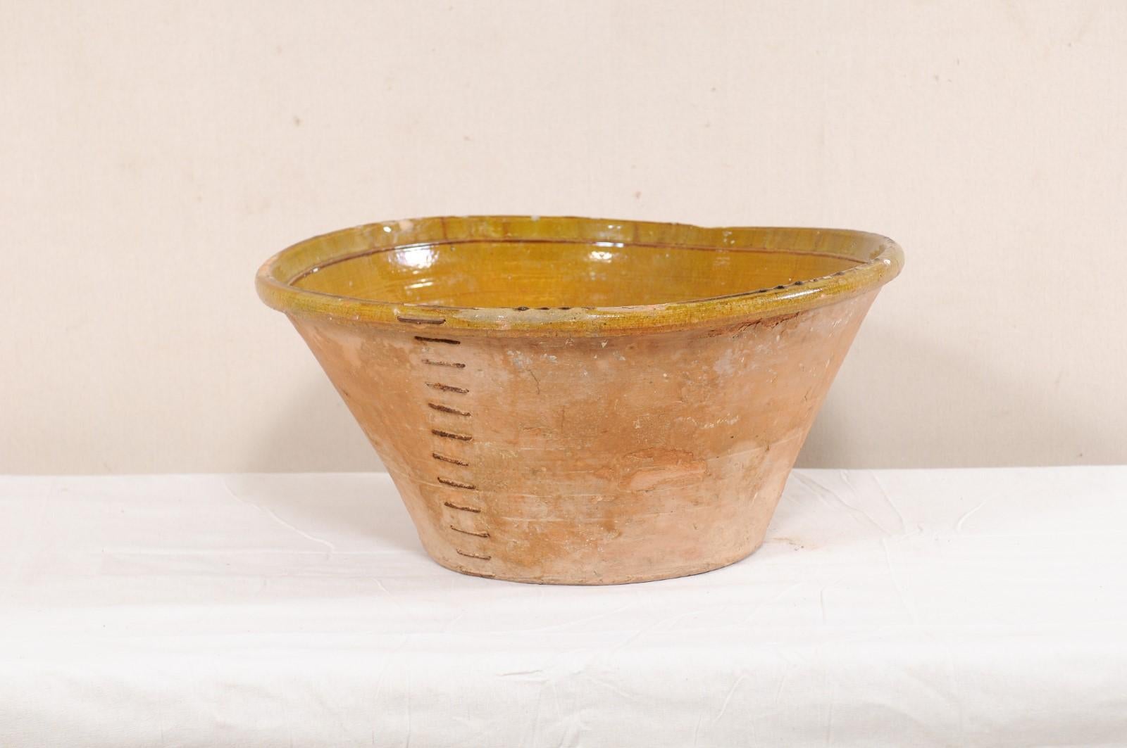 20th Century Spanish Terracotta Bowl w/ Muted Yellow & Pale Green Inner Glaze and Old Mending
