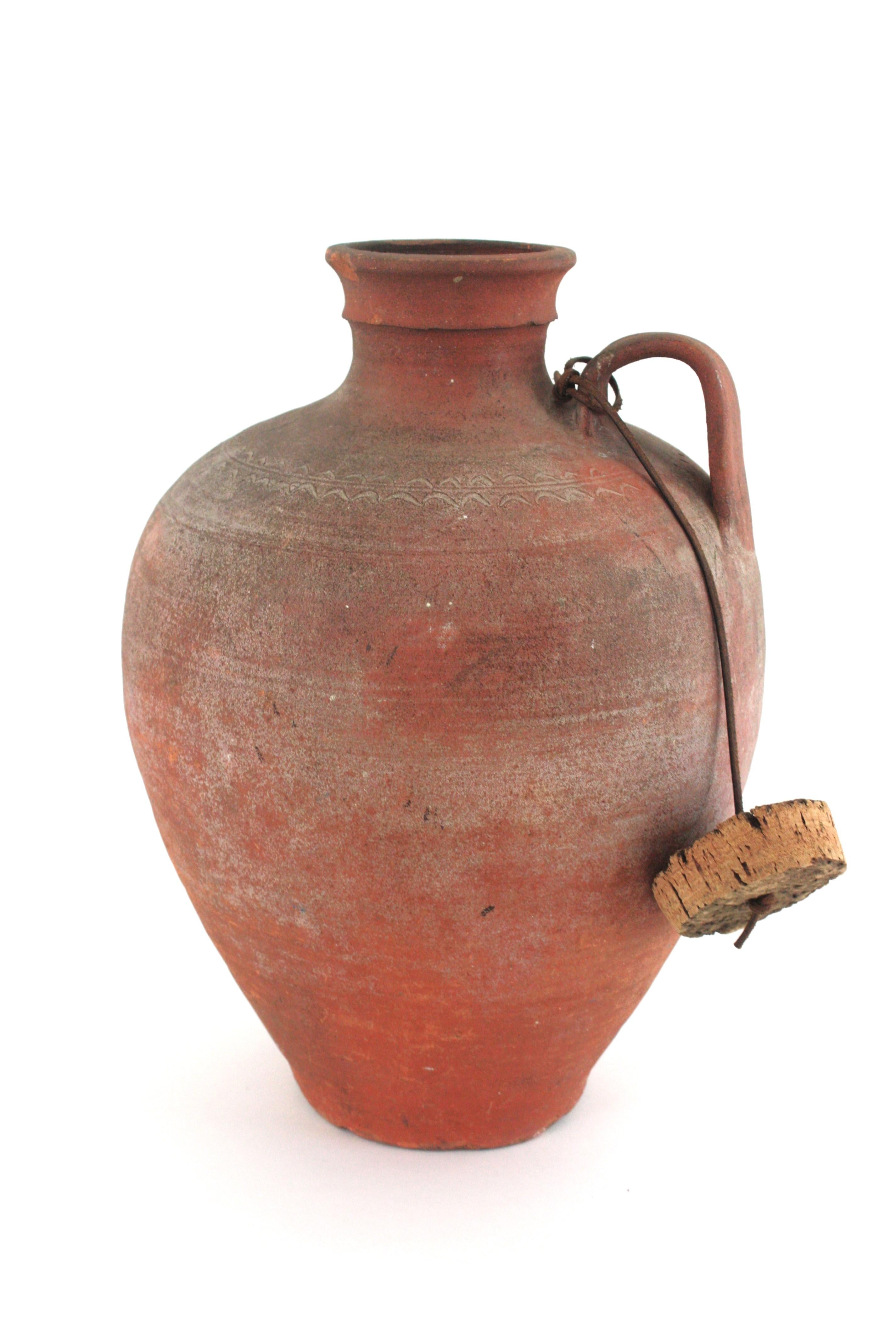 20th Century Spanish Terracotta Water Jar with Single Handle and Cork Plug For Sale