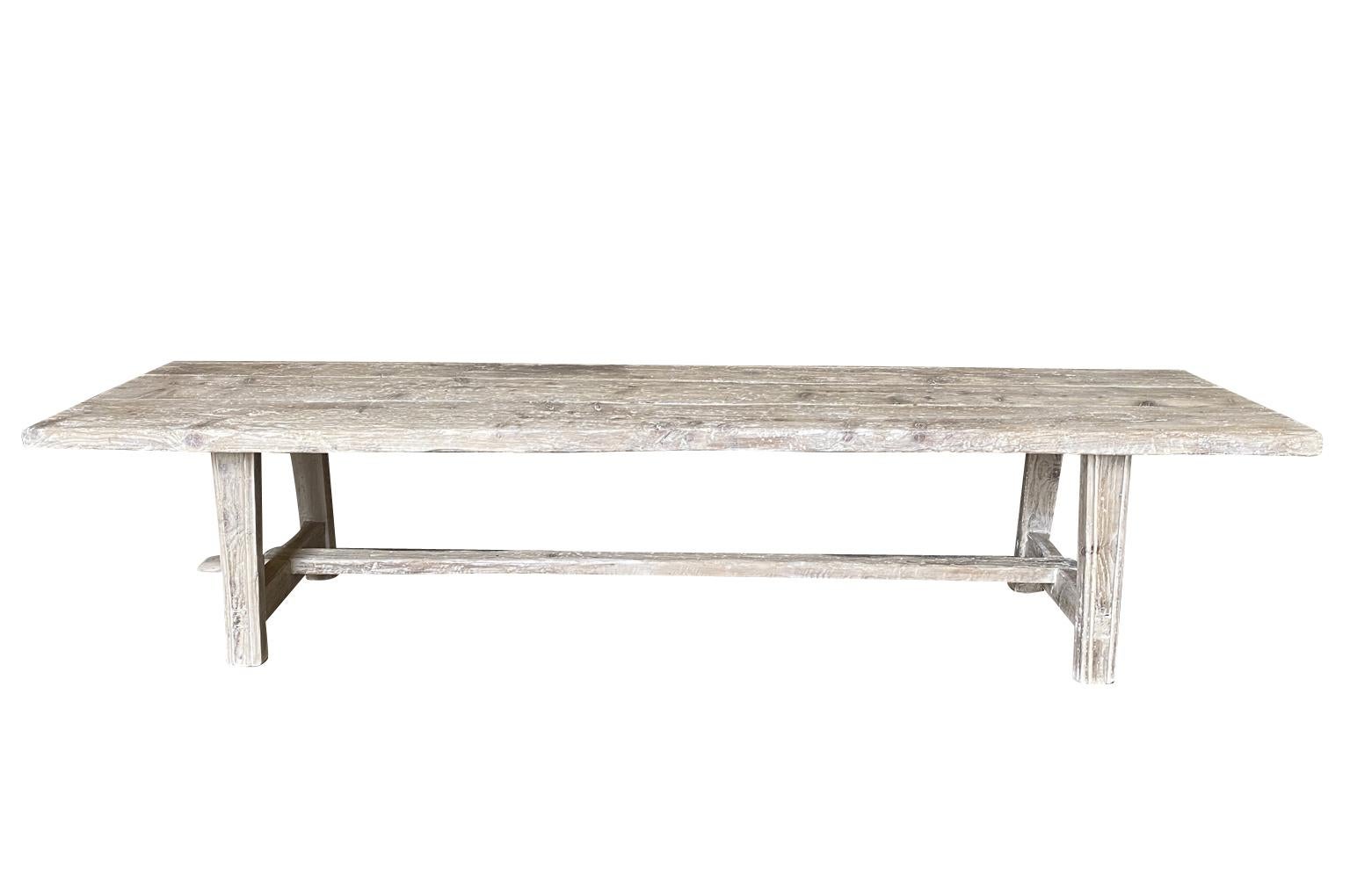 A wonderful rustic farm table - Trestle table from Spain beautifully constructed from antique Meleze - very hard pine. Wonderful Minimalist design. Perfect for large gatherings.