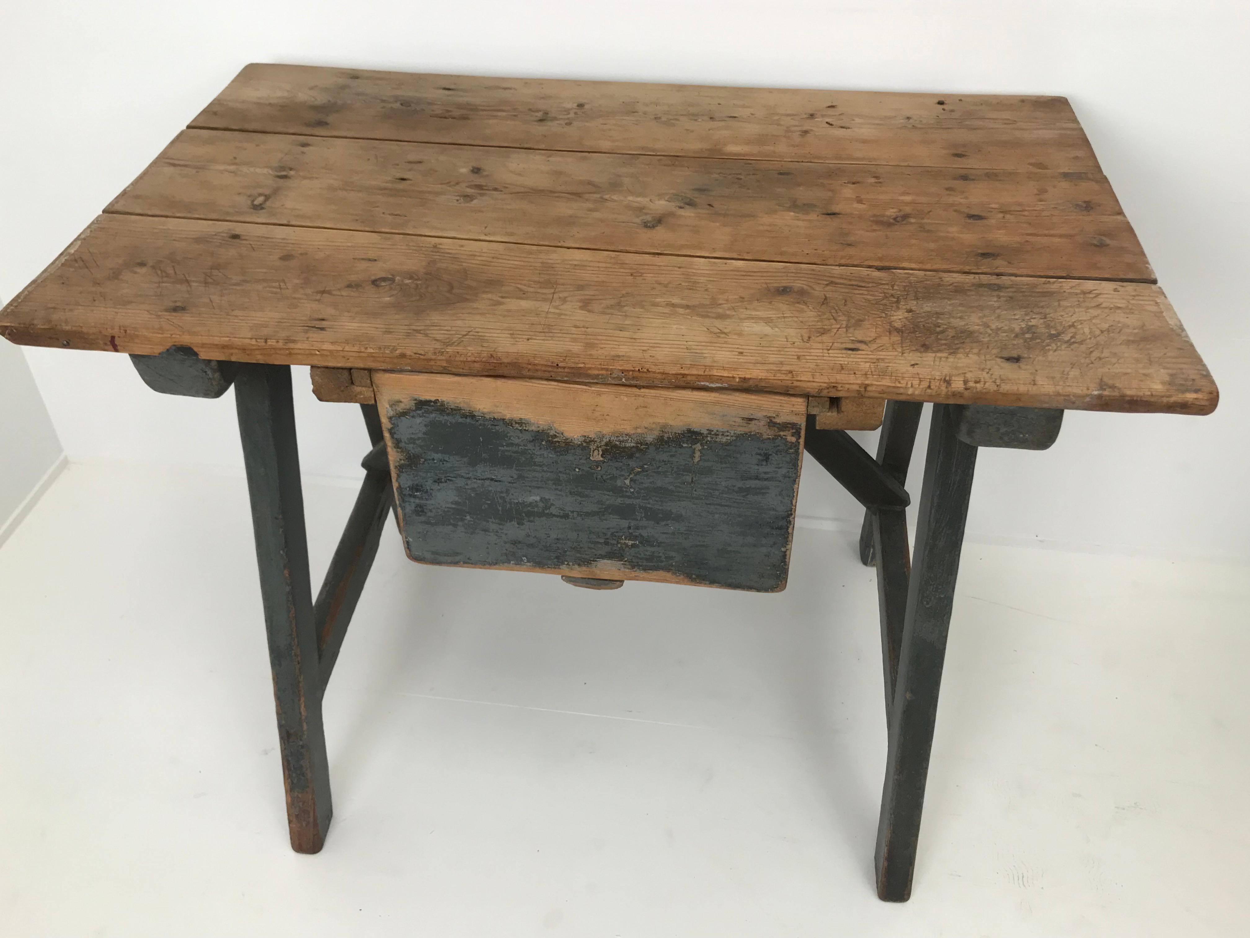 Very decorative Spanish trestle table with blue painted patina,
Zaragoza, 19 th Century,
one drawer,
the table has its original patina and a warm and worn shine,
a table full of charm and authenticity,powerful table