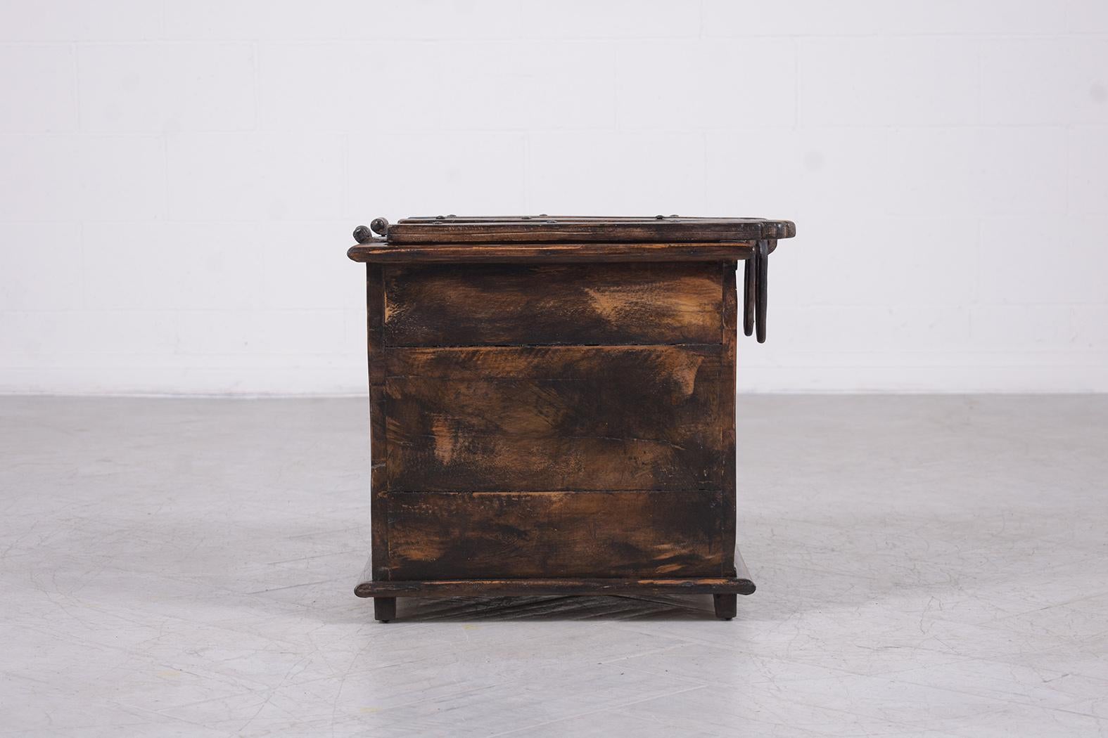 Step into the rich tapestry of the 1970s with our meticulously restored Spanish-style trunk. Hand-crafted with precision from wood, this vintage gem showcases a profound dark walnut hue, complemented by artfully applied distressed details. Our