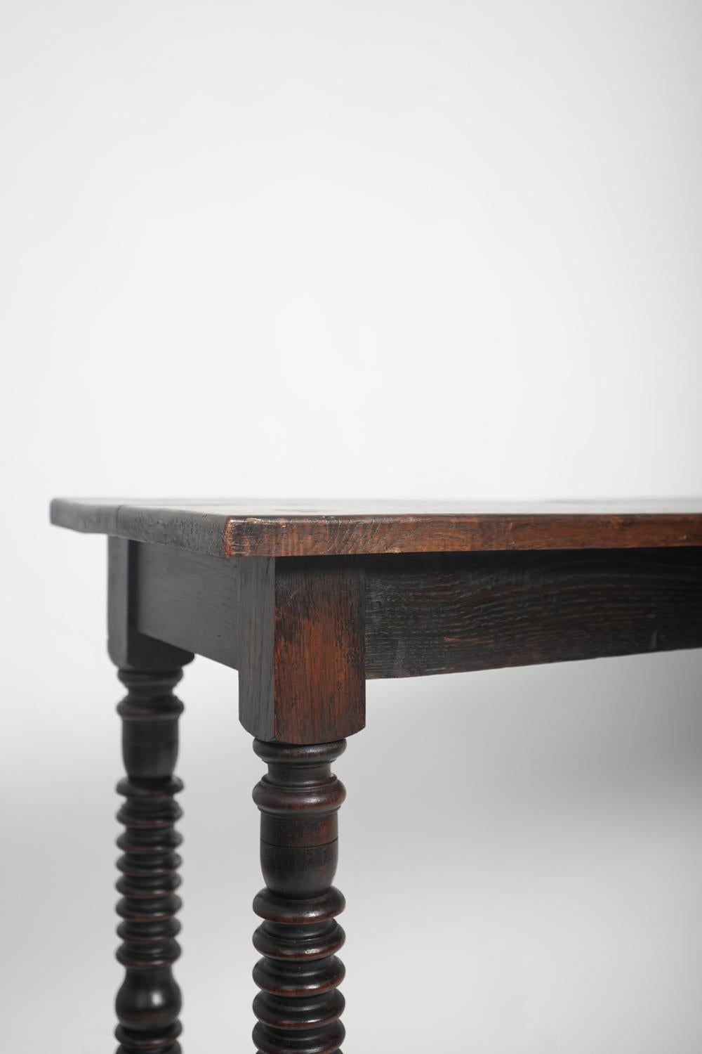 Turned ebonised wood table console resting on four legs joined by a spacer. Spain , 19th c
