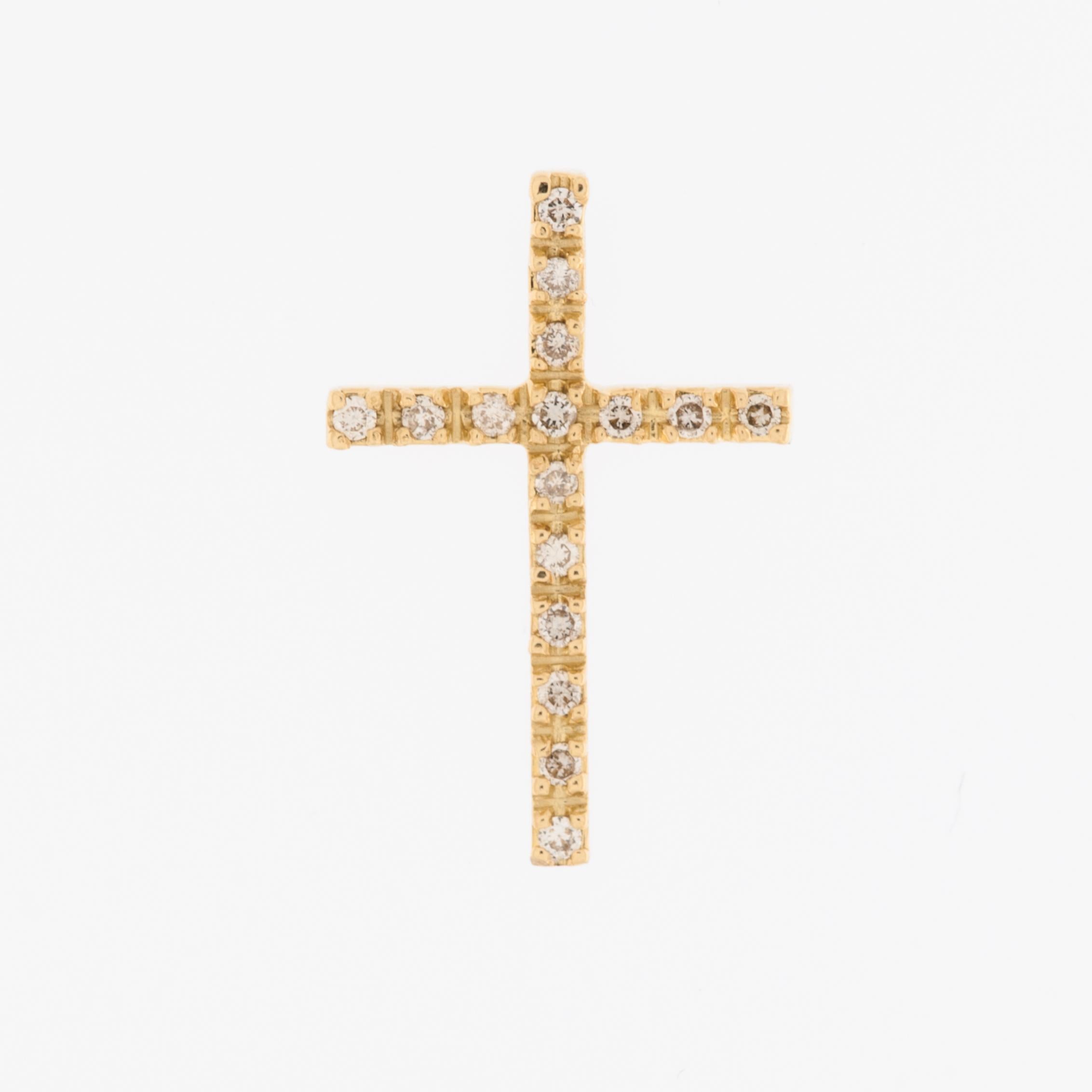 This wonderful cross is crafted from 18-karat yellow gold, known for its lustrous and rich appearance. This high-quality gold is often used in fine jewelry due to its durability and timeless appeal.
The 18kt yellow gold enhances the visual appeal,