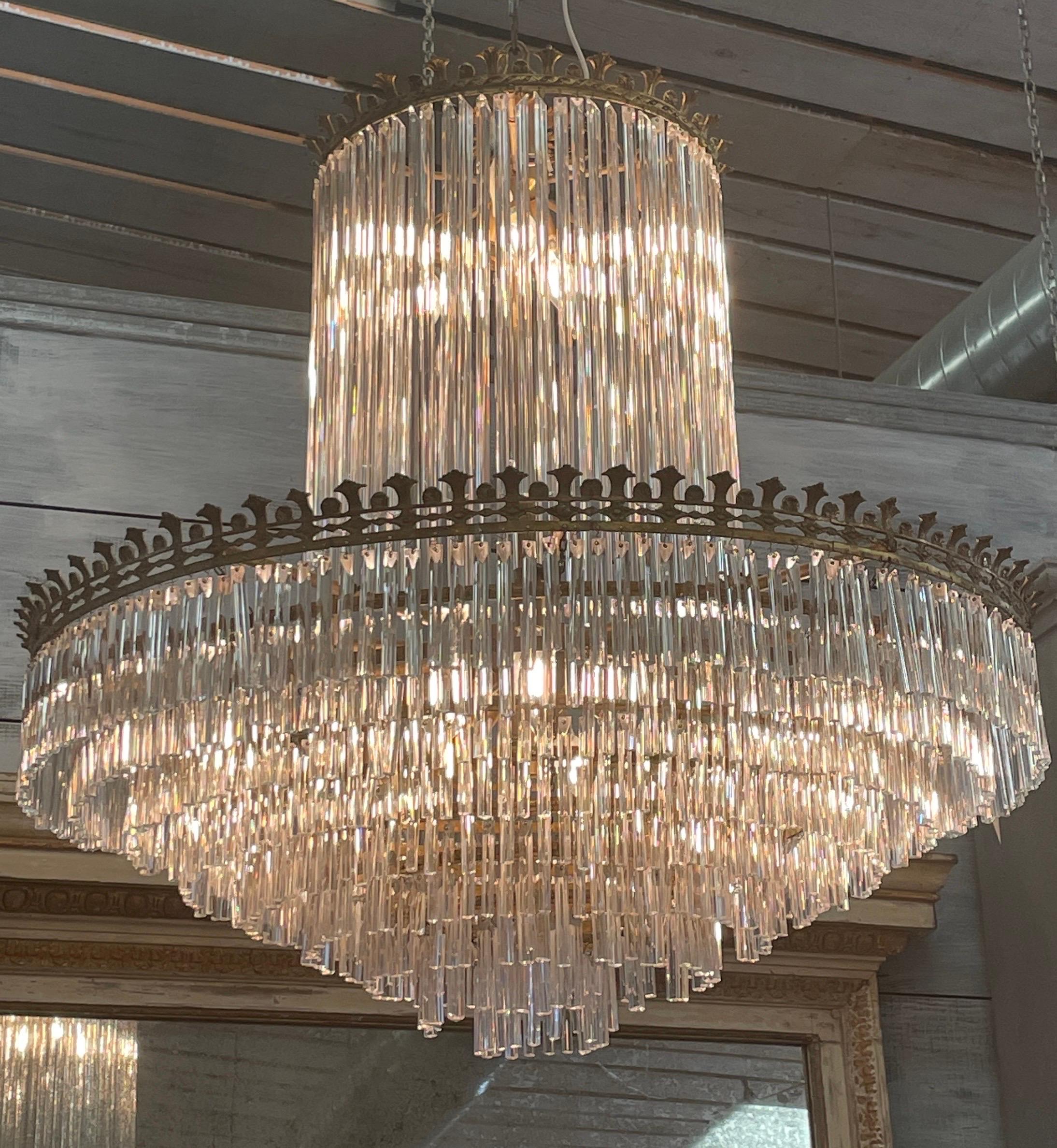 This is a gorgeous cascading crystal chandelier from the mid 1900s Spain. It’s the wow factor that makes a statement in any room.
It has some missing crystals but so full that they are hardly missed.
