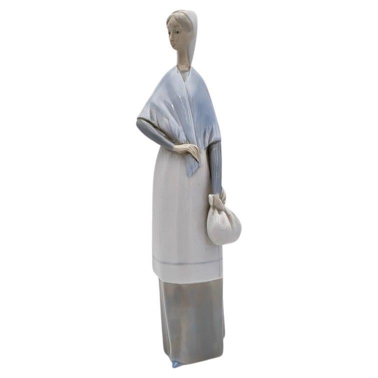 Spanish woman porcelain figurine by Lladro.