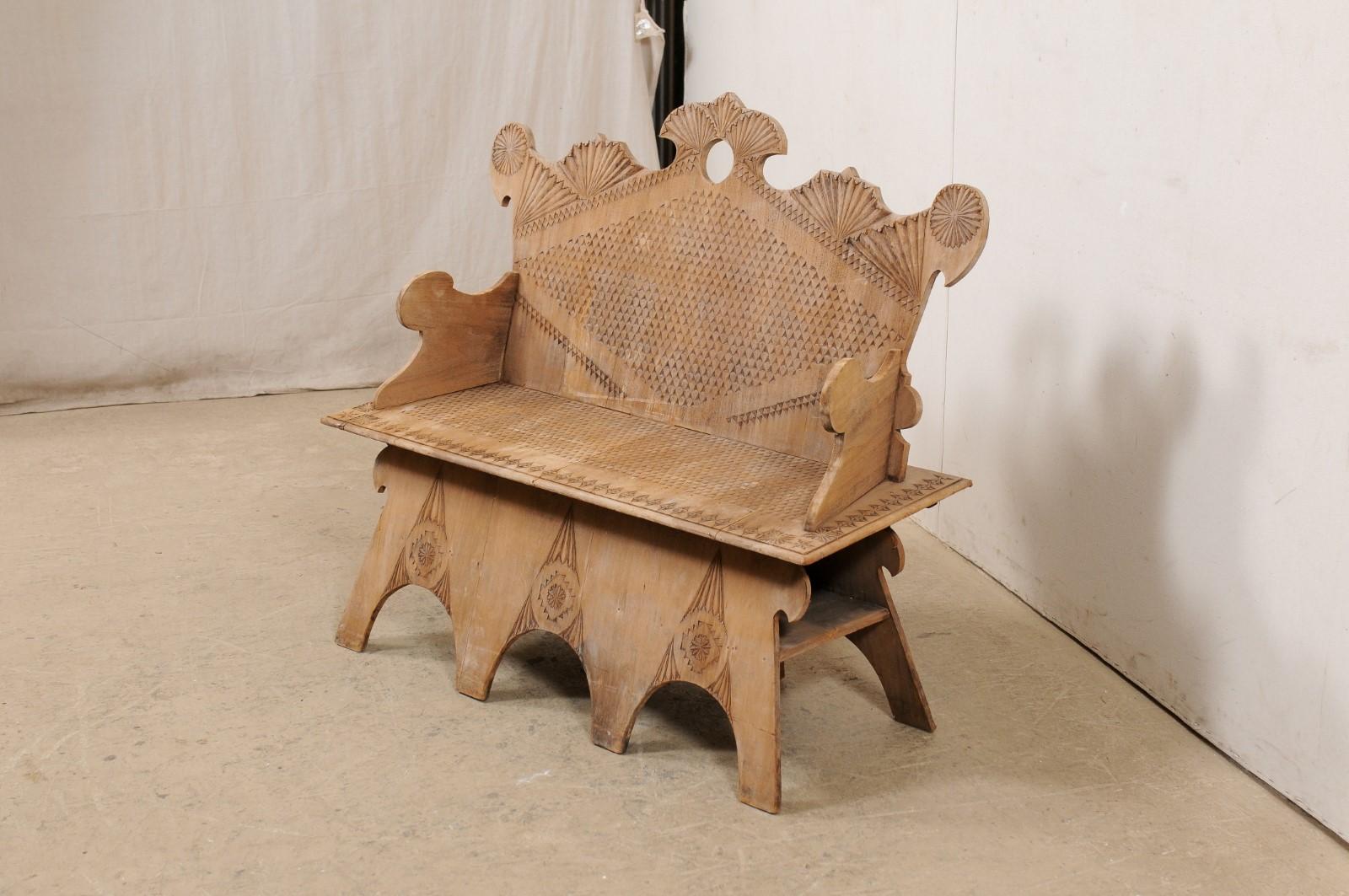 carved wood bench with back