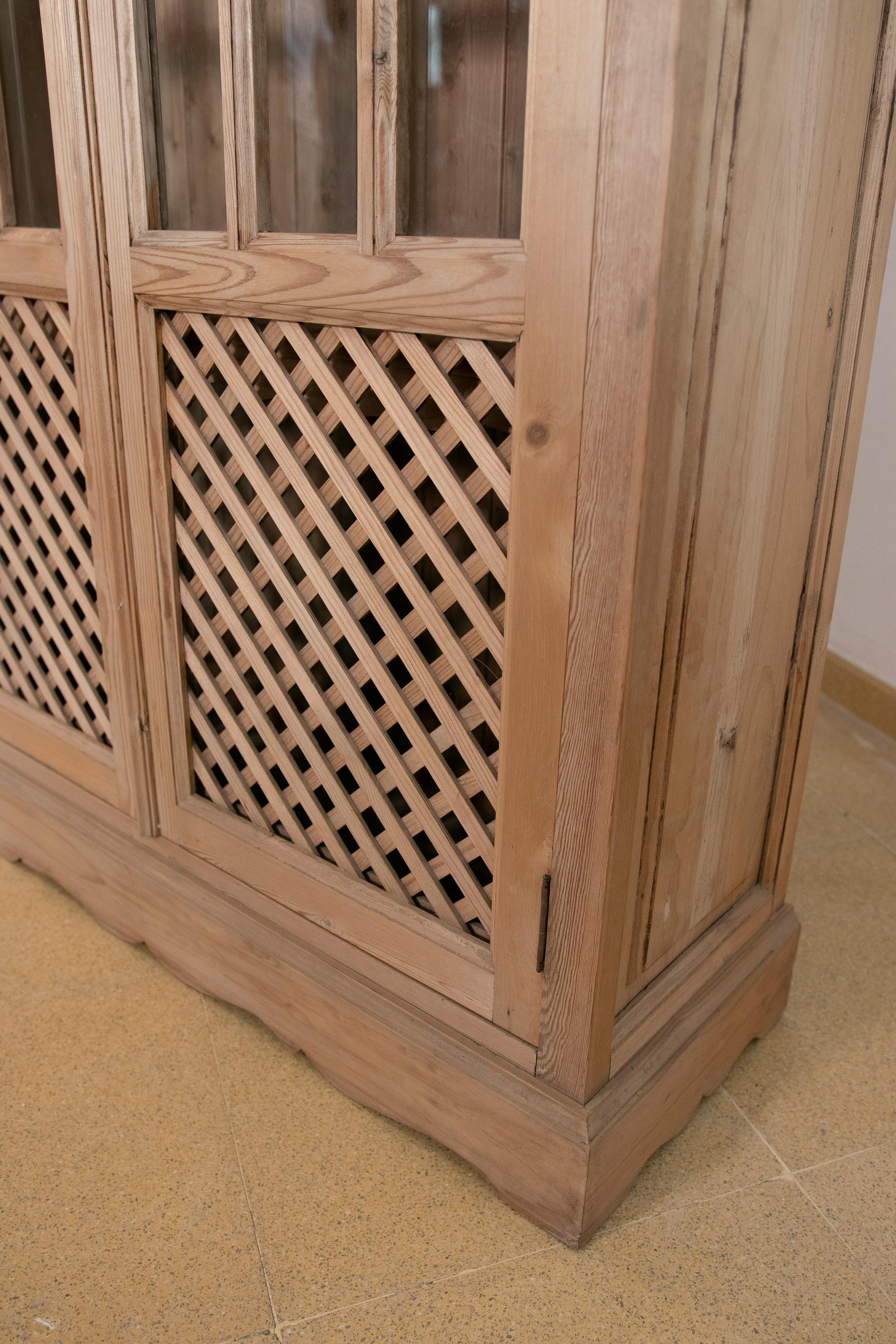 Spanish Wooden Cabinet with Glass Doors and Latticework For Sale 7