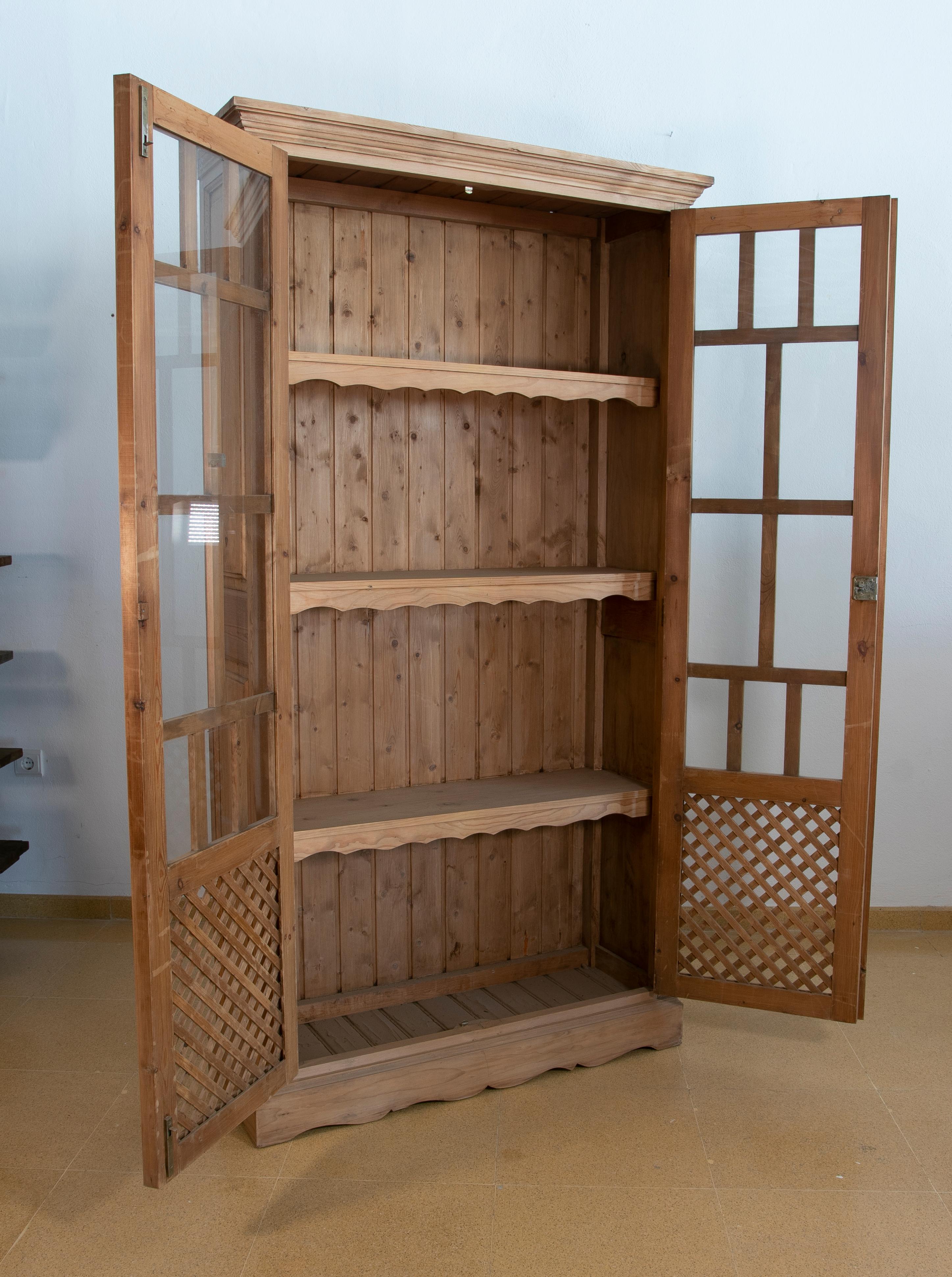 Spanish Wooden Cabinet with Glass Doors and Latticework For Sale 9