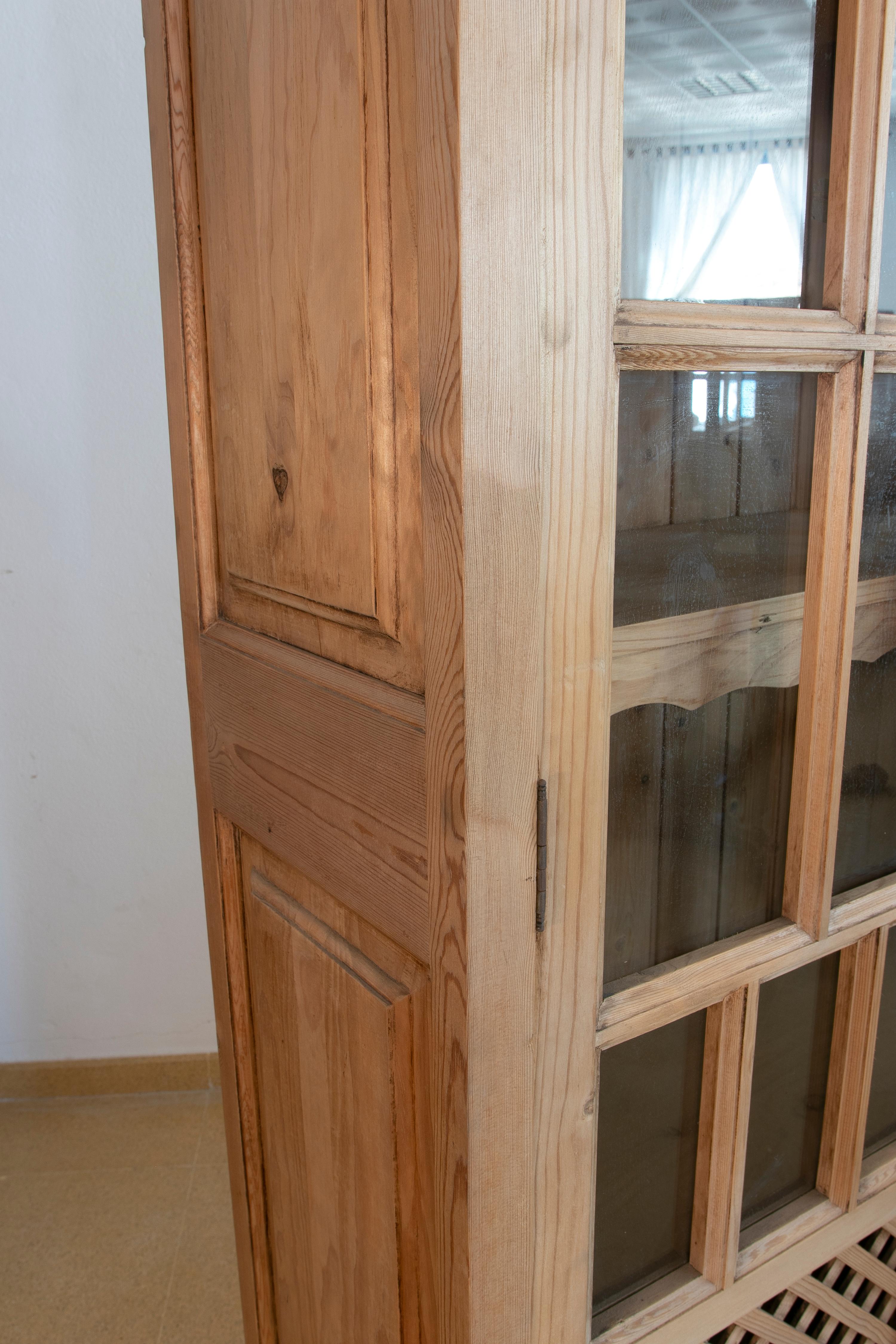 Spanish Wooden Cabinet with Glass Doors and Latticework For Sale 10