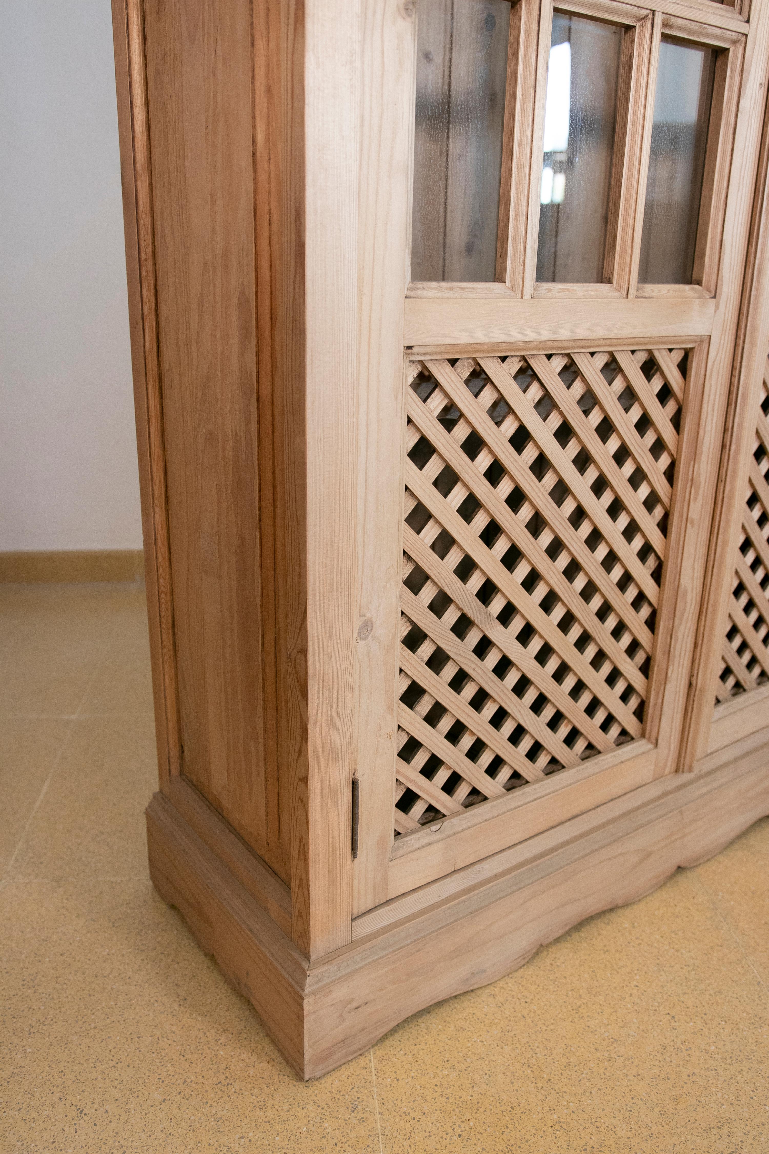 Spanish Wooden Cabinet with Glass Doors and Latticework For Sale 4