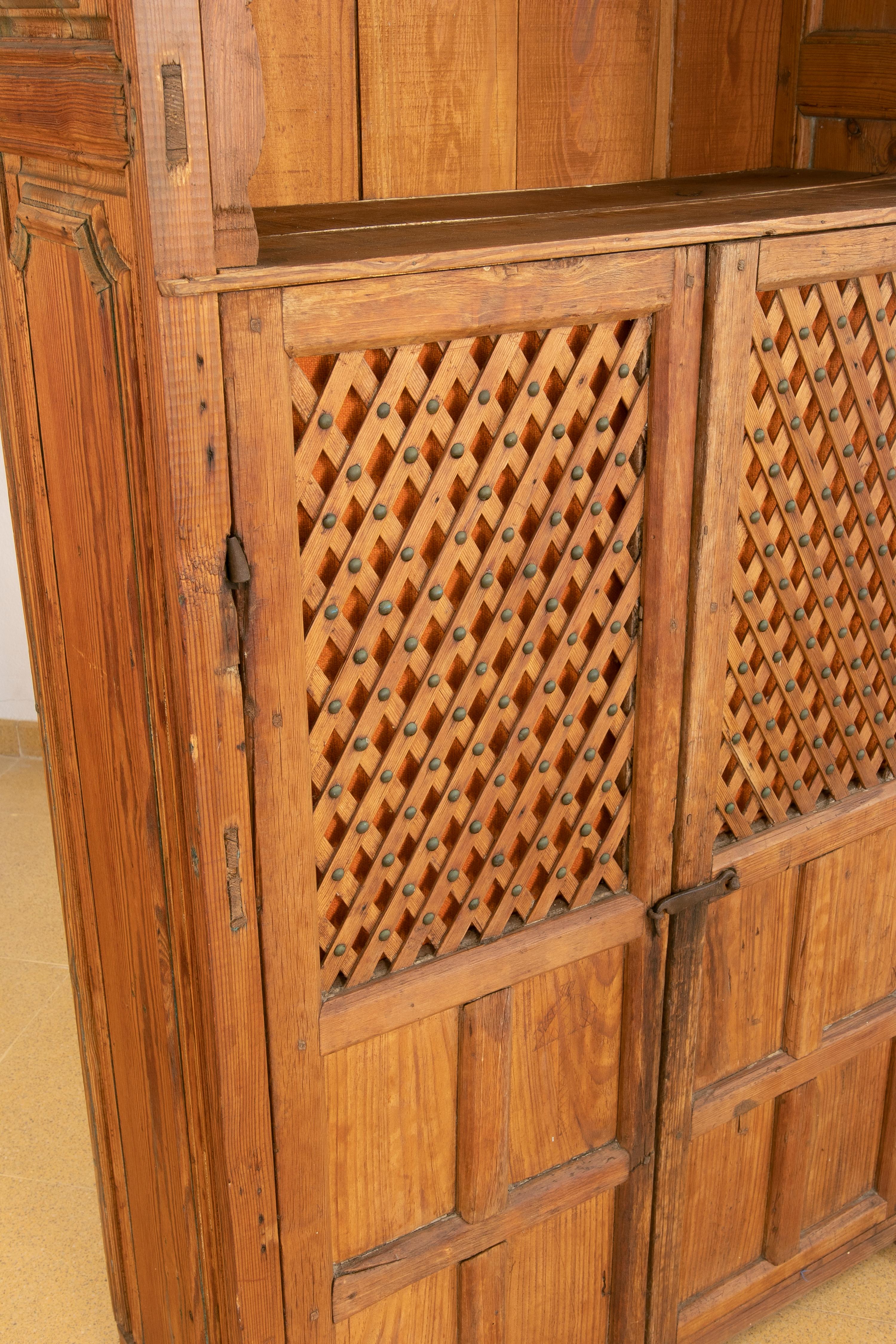 Spanish Wooden Cupboard with Shelves and Lattice Doors For Sale 6