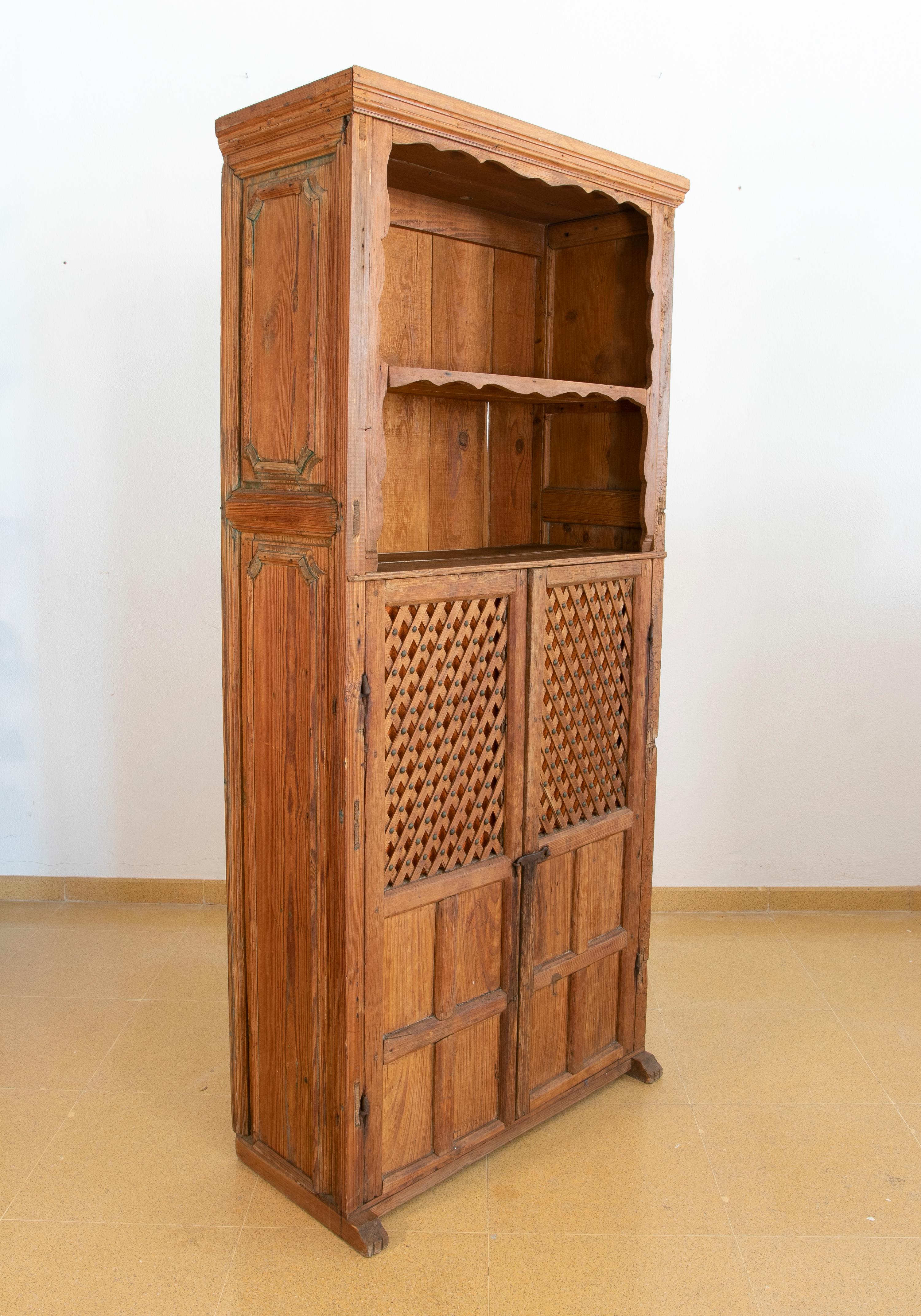 20th Century Spanish Wooden Cupboard with Shelves and Lattice Doors For Sale