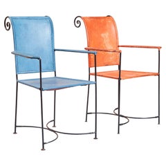 Sillones españoles de hierro forjado y cuero según Jacques Adnet