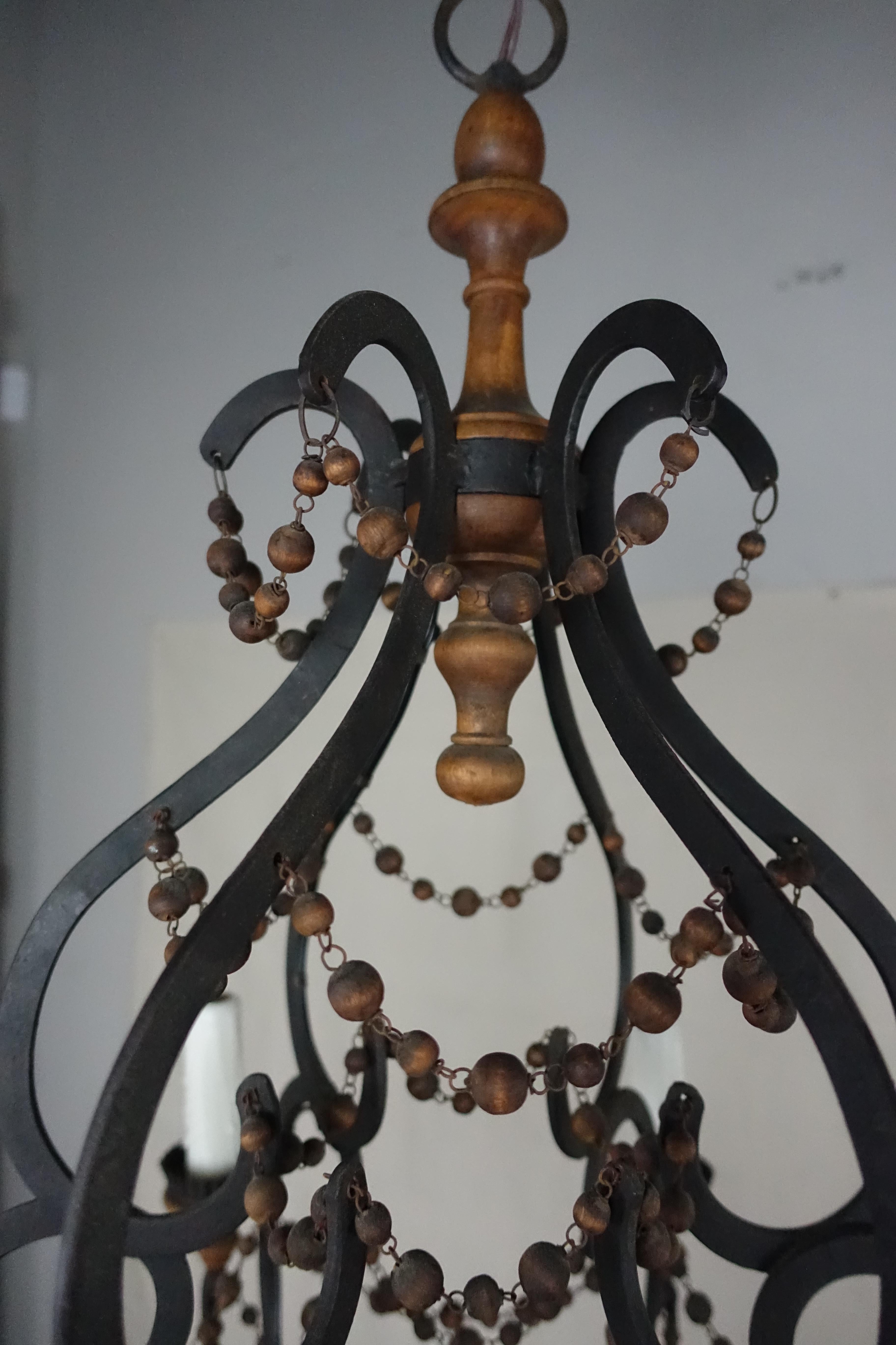 wood and wrought iron chandelier
