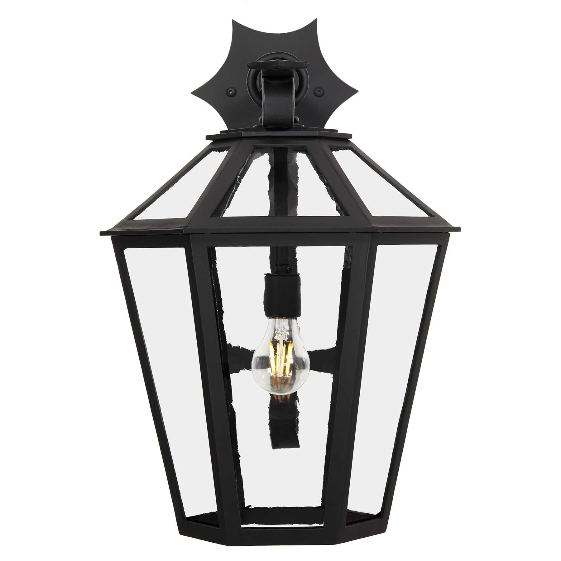 This Heirloom Quality Lantern designed by Architect Anthony Grumbine features a classic tapered form, dramatic curved arm and star detailing, this large hexagonal fixture is striking in numerous exterior, as well as interior, settings and