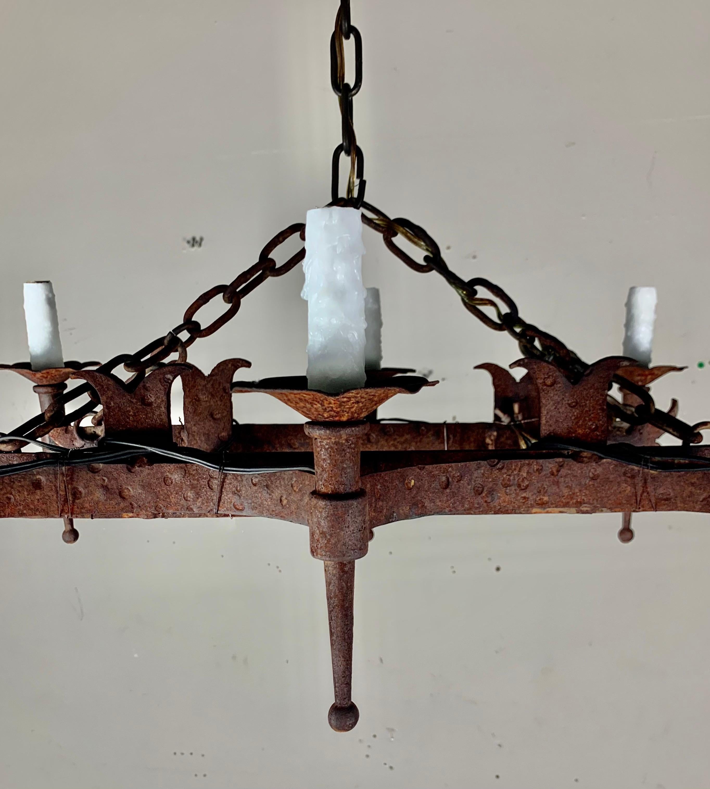 Spanish Wrought Iron Chandelier In Distressed Condition In Los Angeles, CA