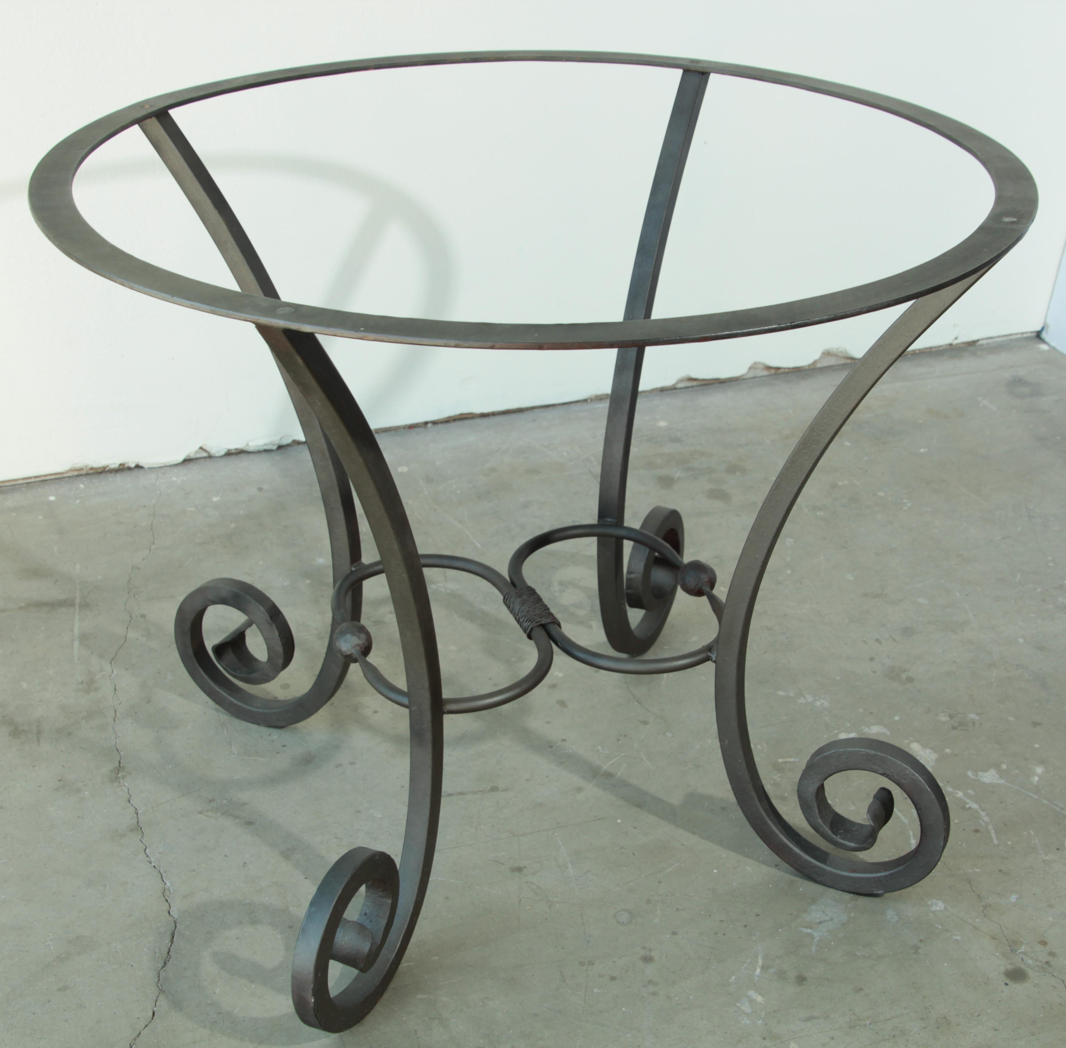 Hand forged Spanish iron table base.
Curved legs and two unique turned iron with two balls in the center.
Wrought iron dining table pedestal with curved legs.
Could be use indoor or outdoor.
Spanish Moorish style.
Listing is for the base only and