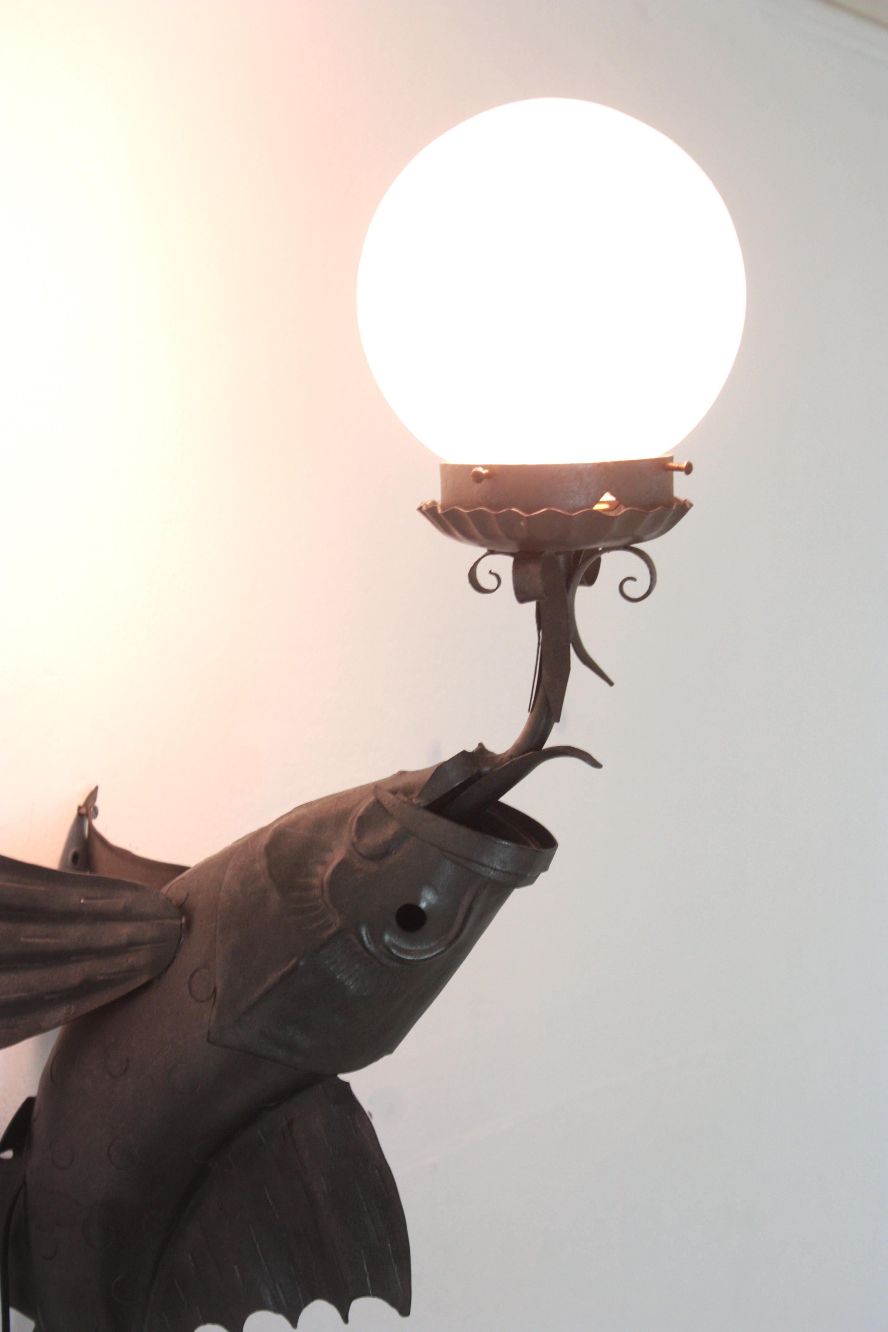 Forged Spanish Wrought Iron Fish Wall Sconce with Frosted Glass Globe For Sale