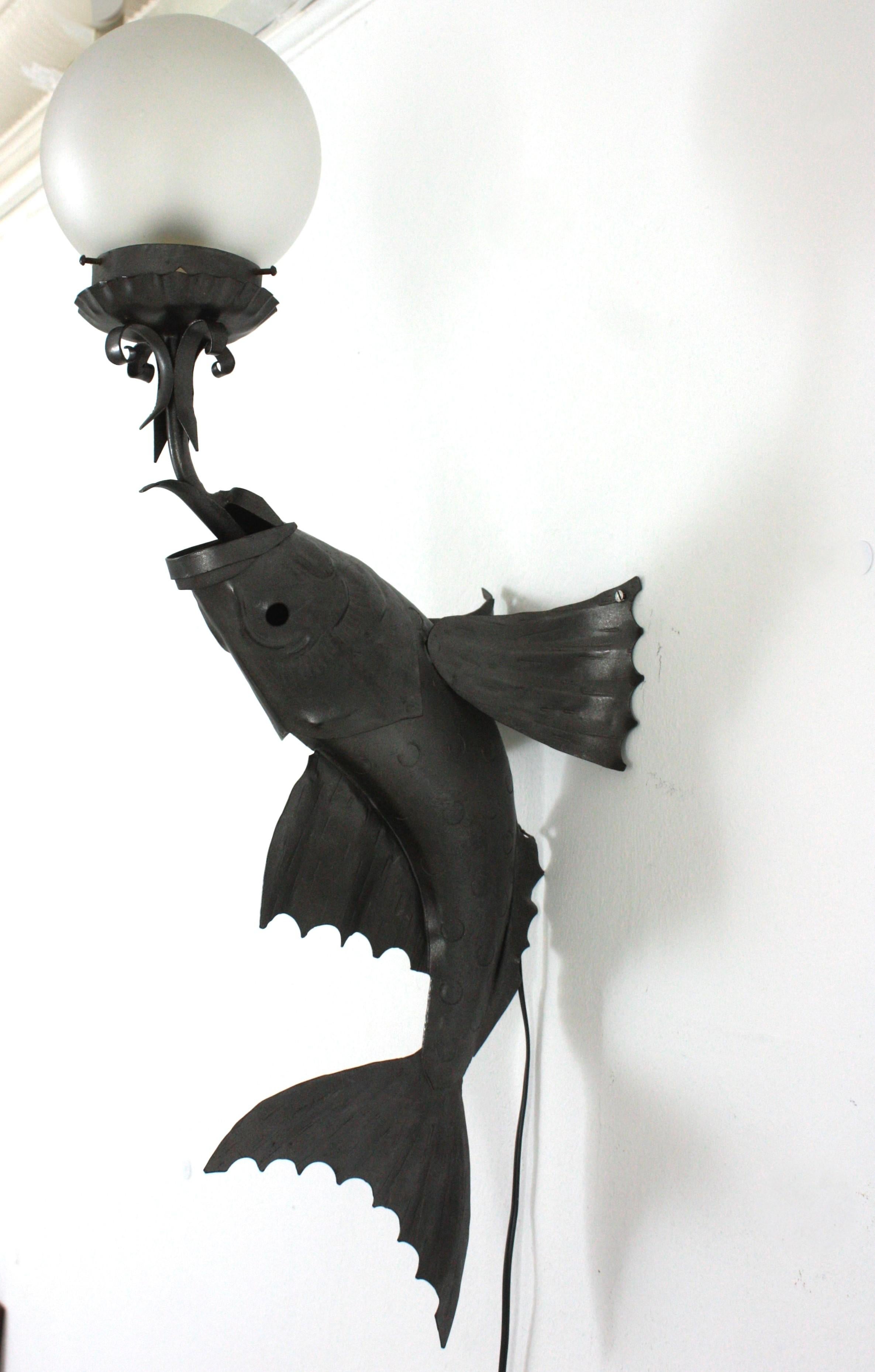20th Century Spanish Wrought Iron Fish Wall Sconce with Frosted Glass Globe For Sale
