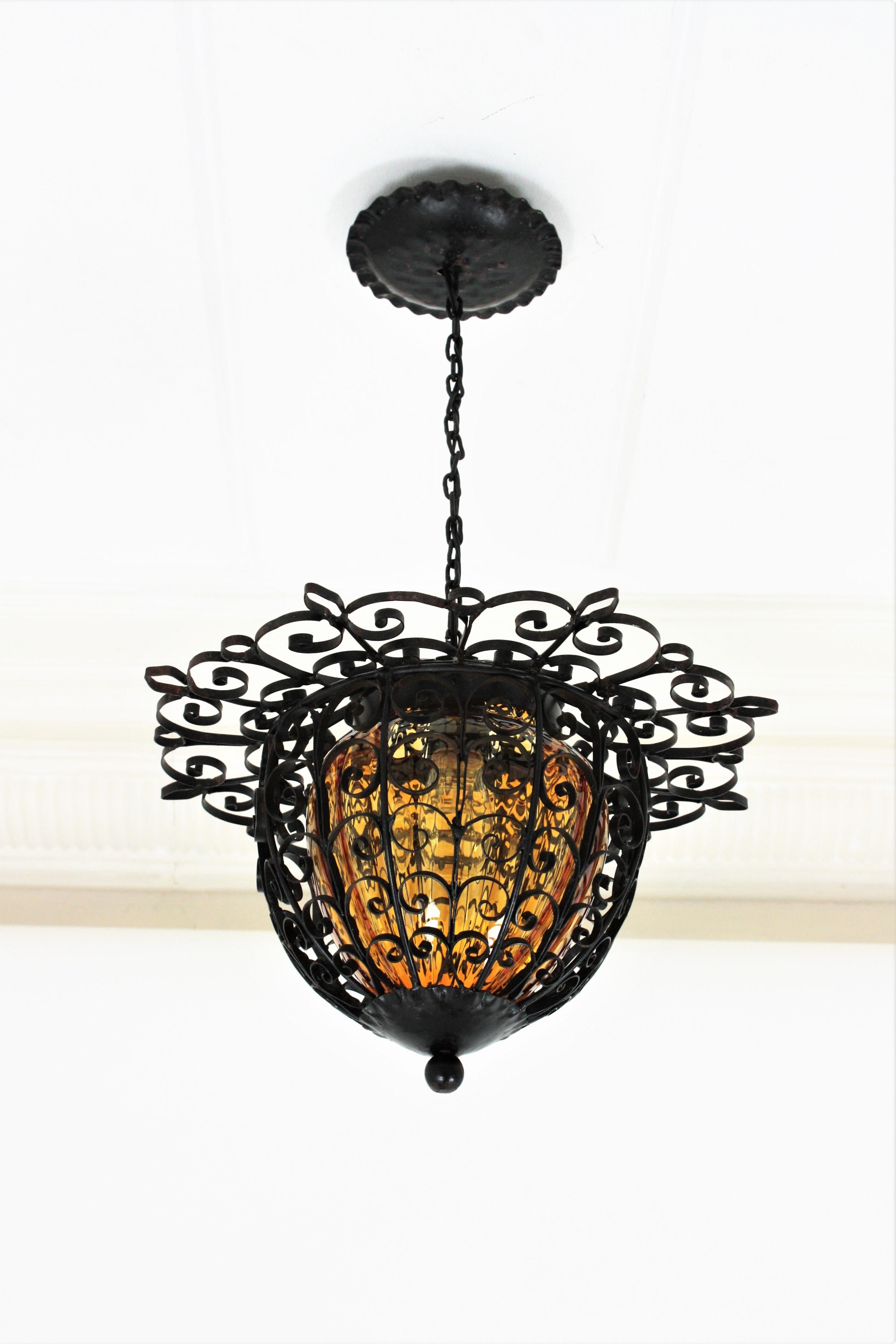 Forged Spanish Wrought Iron Lantern Pendant Light with Hand Blown Glass Shade
