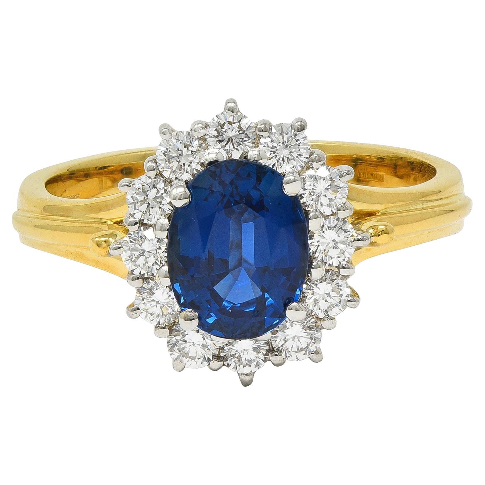 Spark 1990's 2.25 CTW Sapphire Diamond 18 Karat Two-Tone Gold Vintage Halo Ring