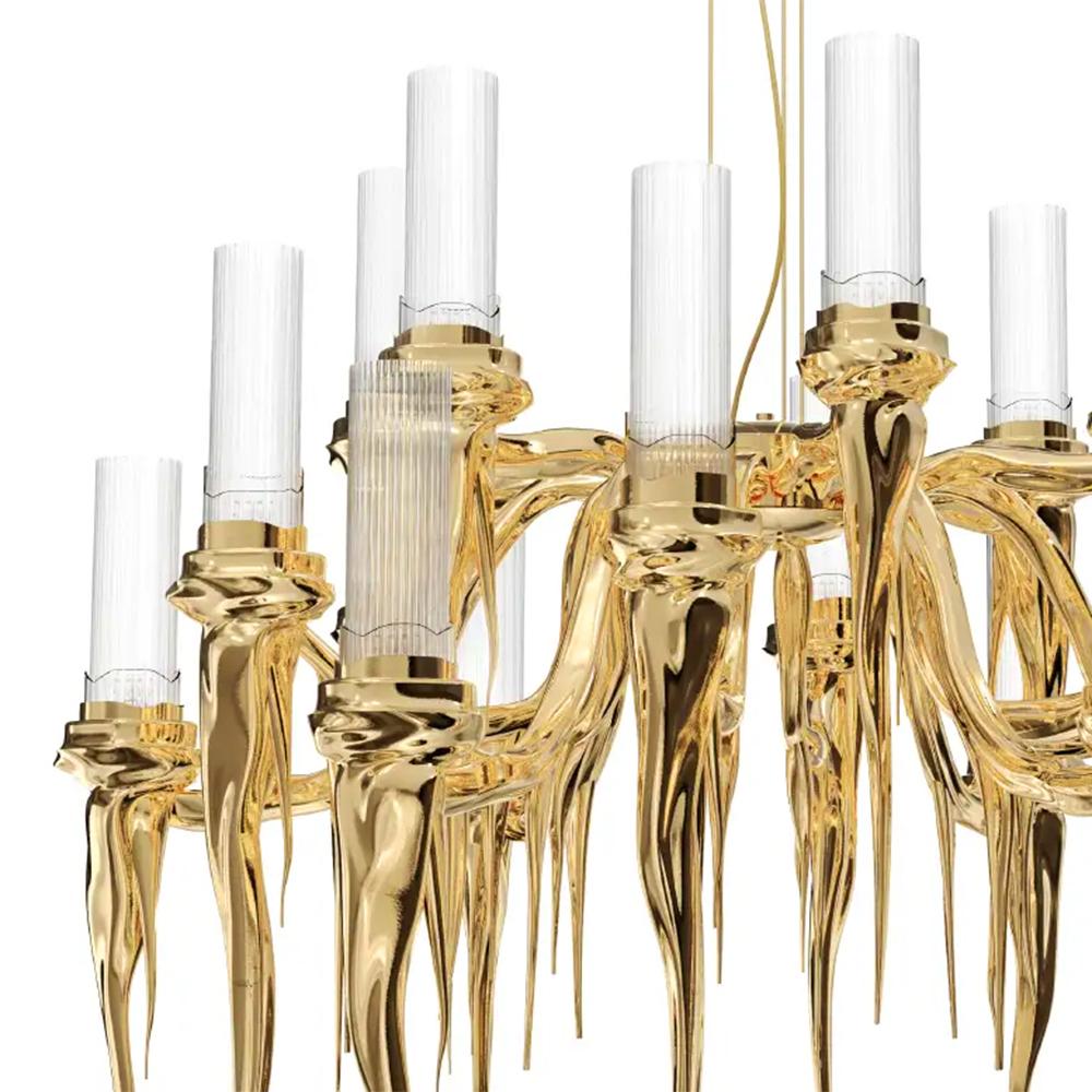 Lustre Spark avec structure en laiton massif plaqué or
finition. Avec abat-jour vertical en verre cristallin. 18 ampoules, support de lampe 
type G9 halogène, 40 Watt max. Pour 220-240V.
Ampoules non incluses. Avec cordon réglable en hauteur : 200